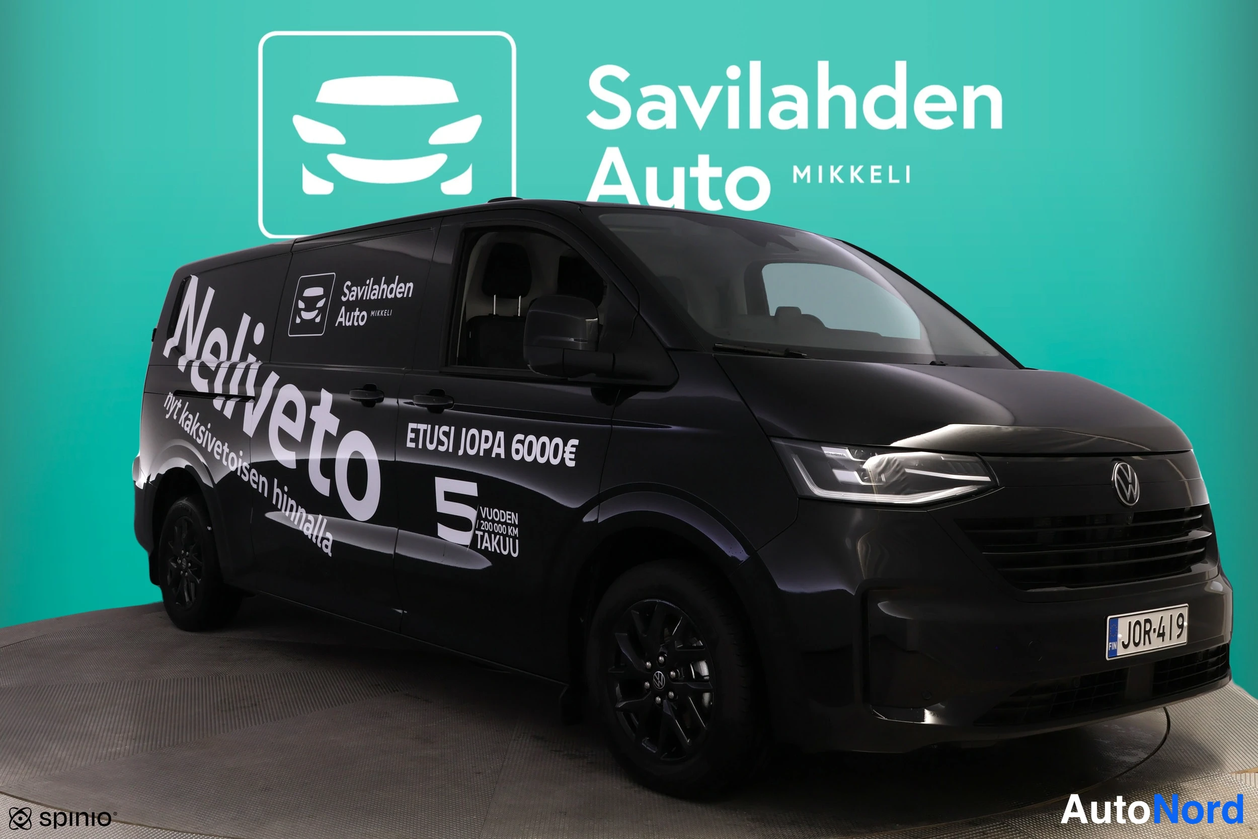 Musta Volkswagen Transporter 2026, etuviisto, keula oikealle, kuva 6