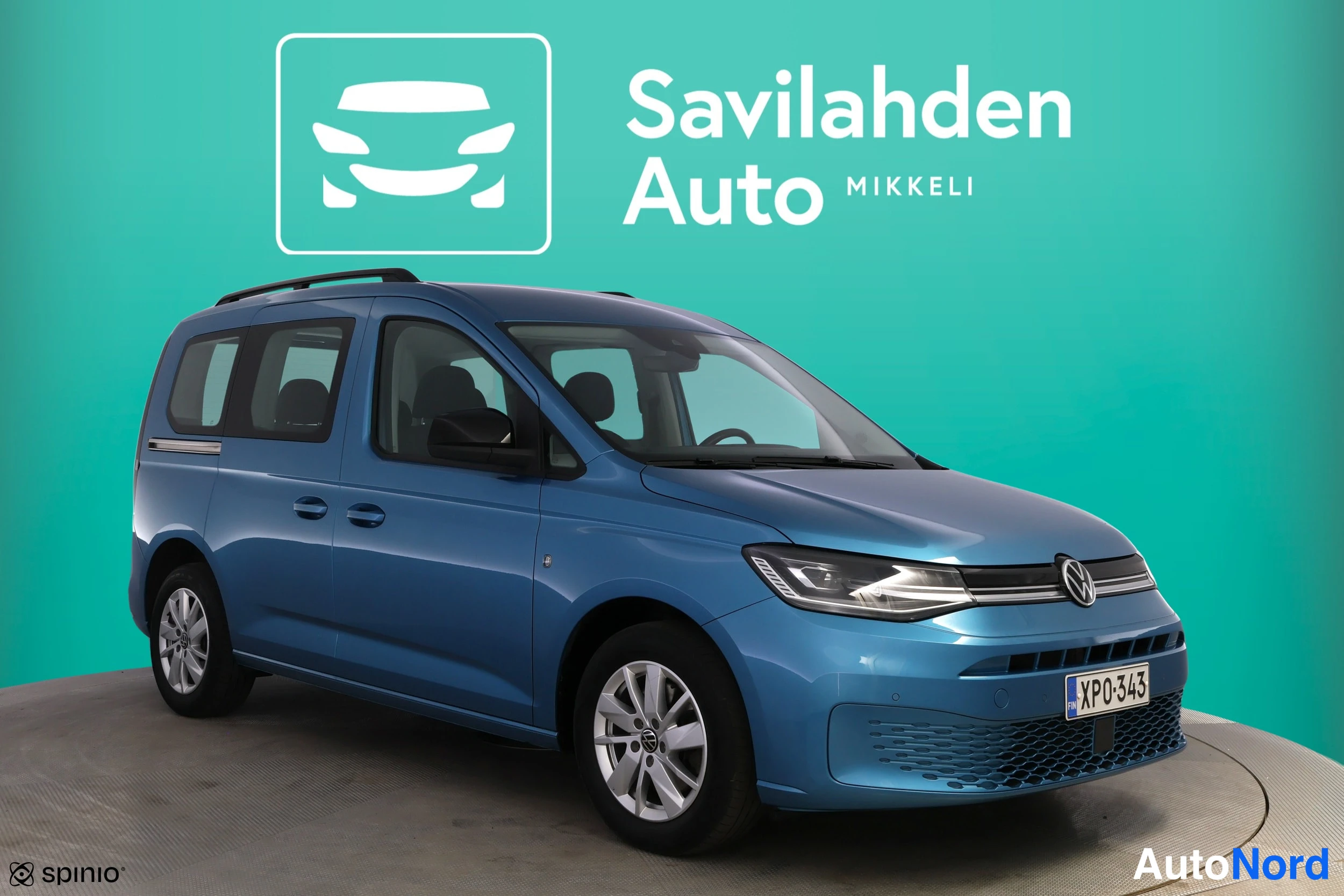 Blå Volkswagen Caddy 2021, snett framifrån, fronten åt höger, bild 5