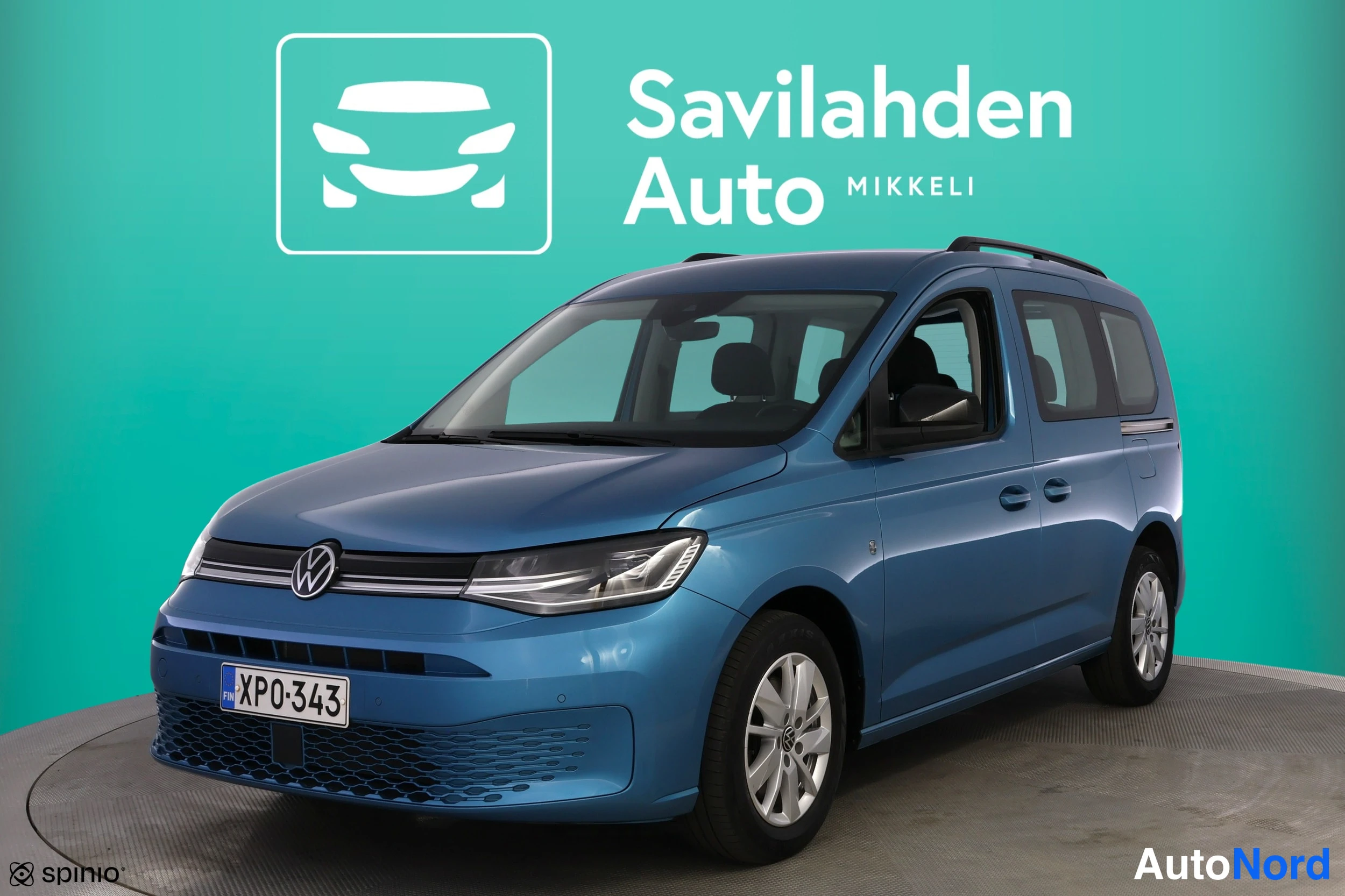 Blå Volkswagen Caddy 2021, snett framifrån, fronten åt vänster, bild 2