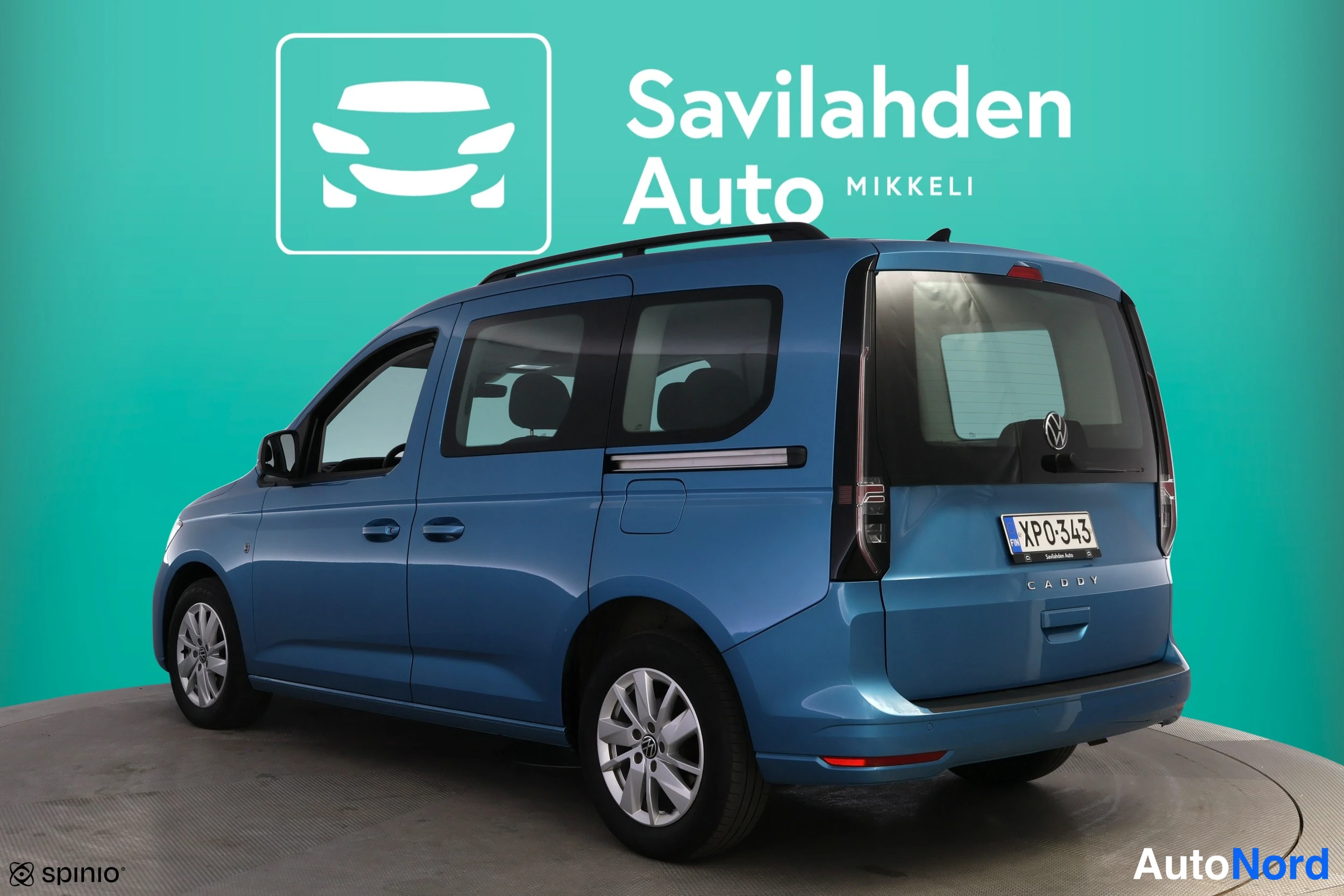 Blå Volkswagen Caddy 2021, snett bakifrån, bild 9