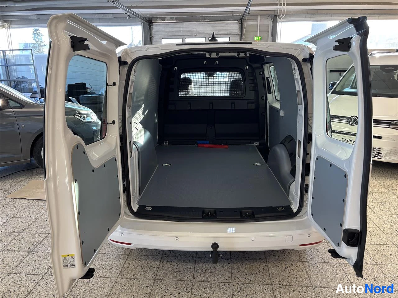 White Volkswagen Caddy 2025, boot, photo 12