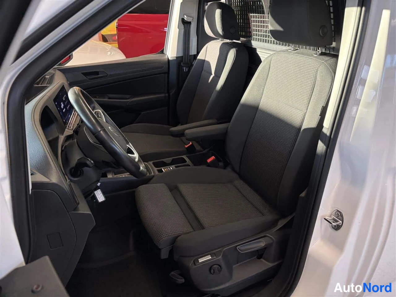 White Volkswagen Caddy 2025, front seats, photo 10