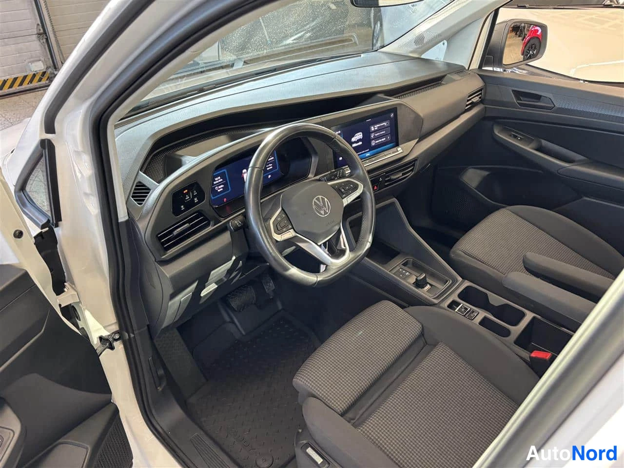 White Volkswagen Caddy 2025, cockpit, photo 7