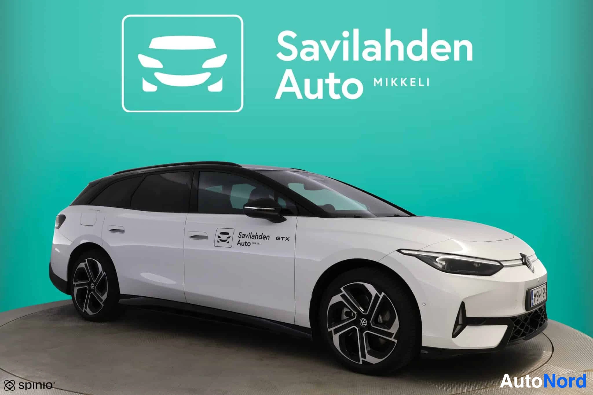 Valkoinen Volkswagen ID.7 2026, etuviisto, keula oikealle, kuva 3