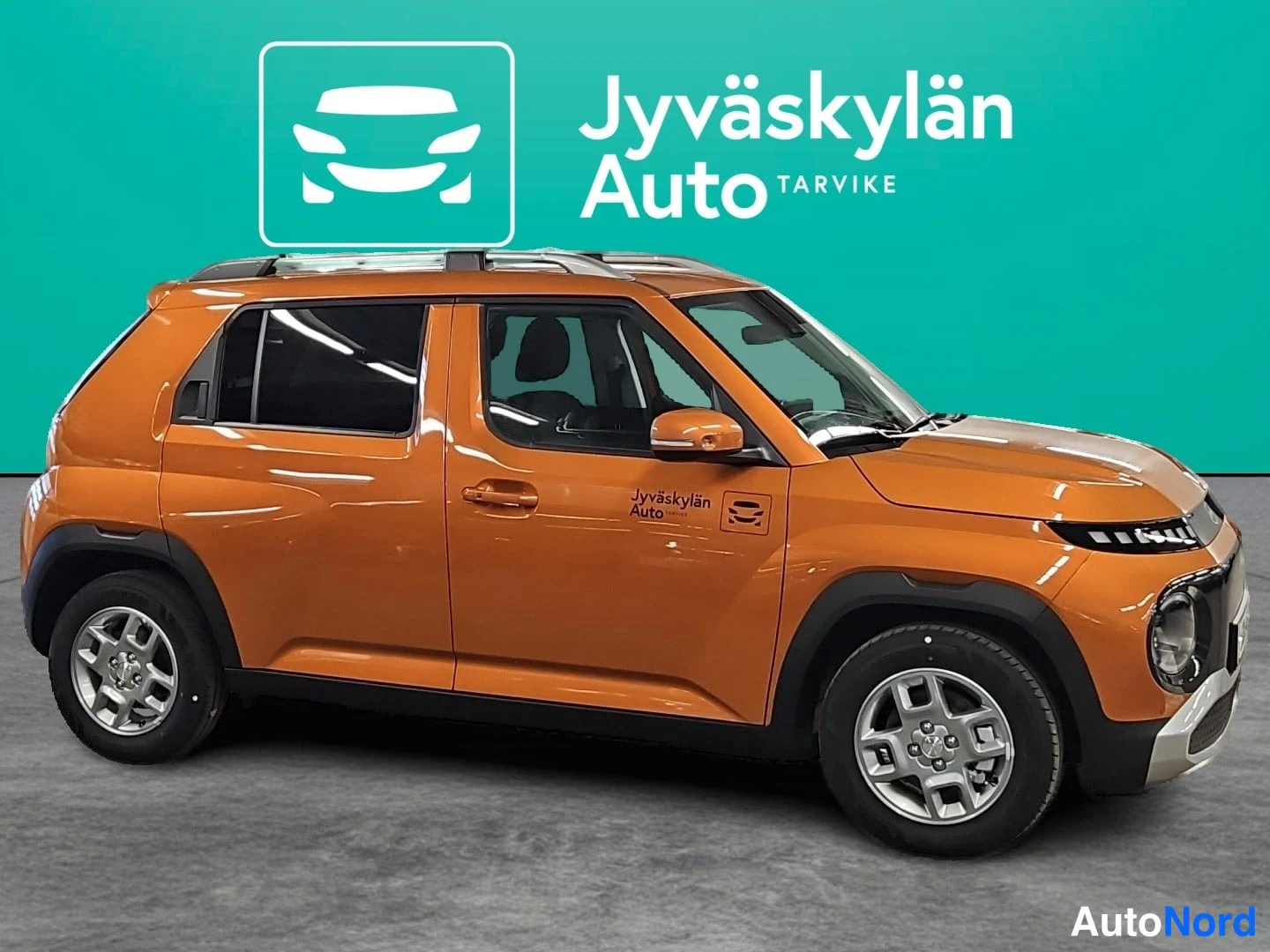 Oranssi Hyundai Inster 2026, etuviisto, keula oikealle, kuva 3