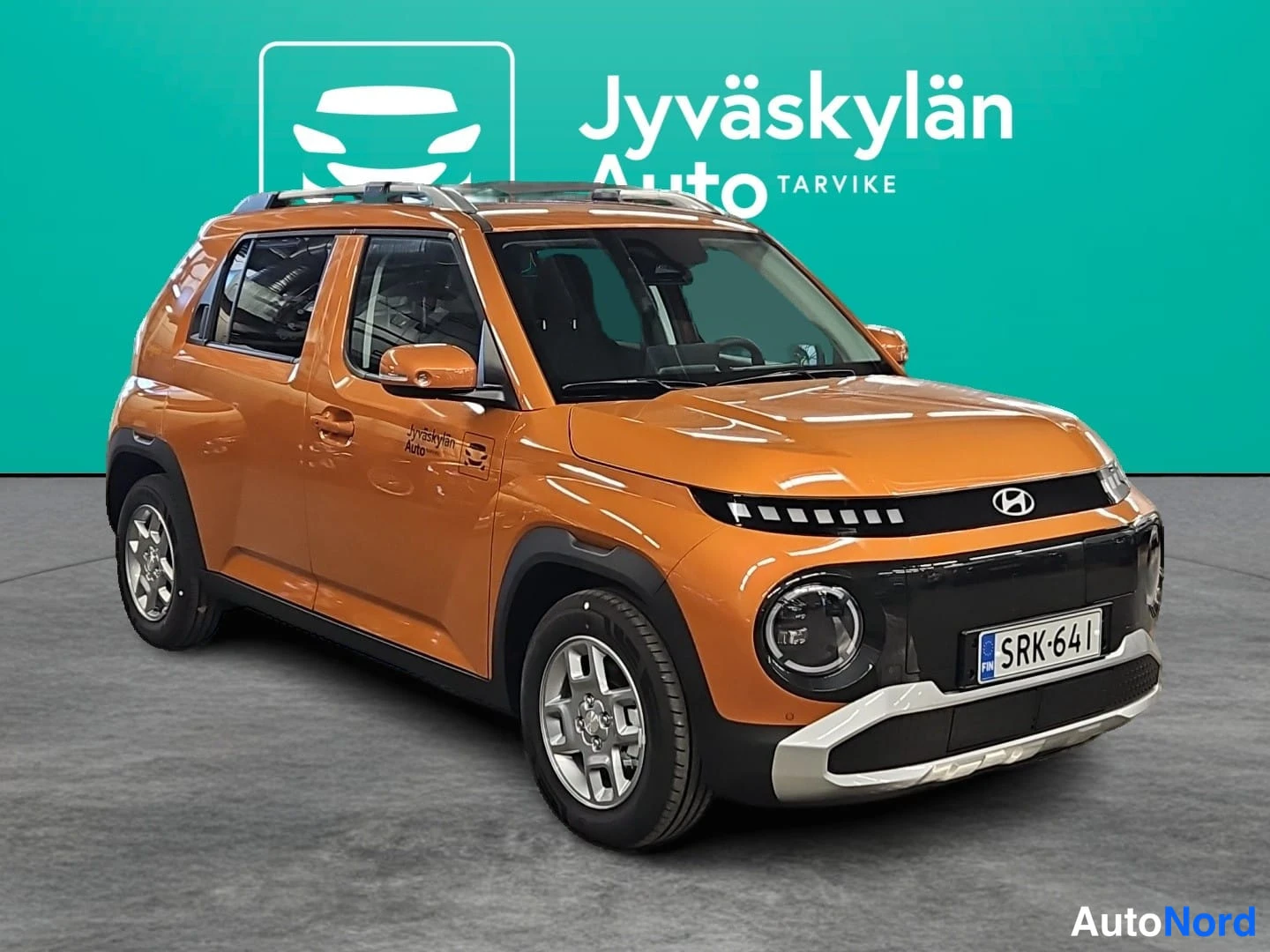 Oranssi Hyundai Inster 2026, etuviisto, keula oikealle, kuva 4