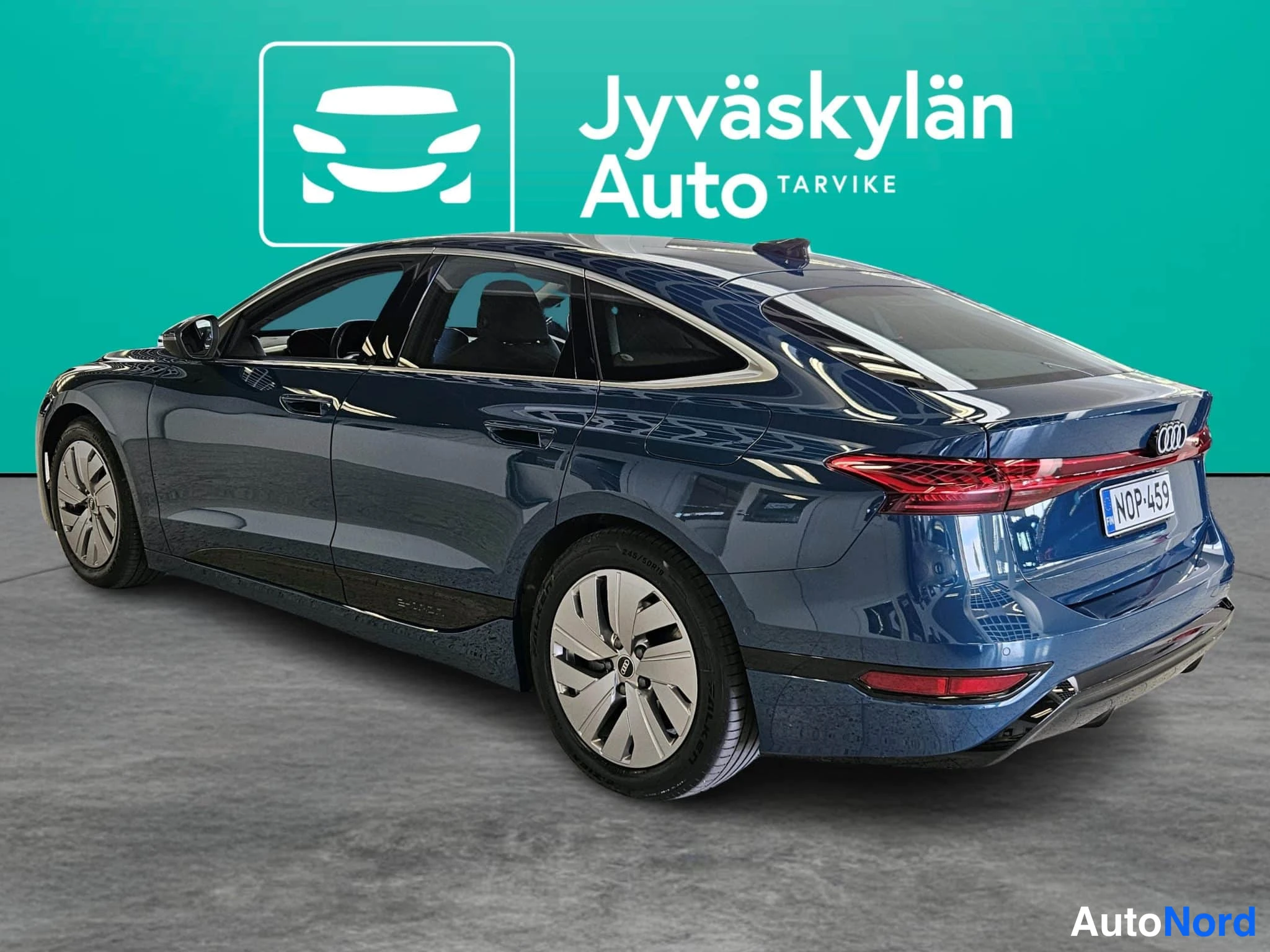 Blå Audi A6 e-tron 2026, snett bakifrån, bild 11