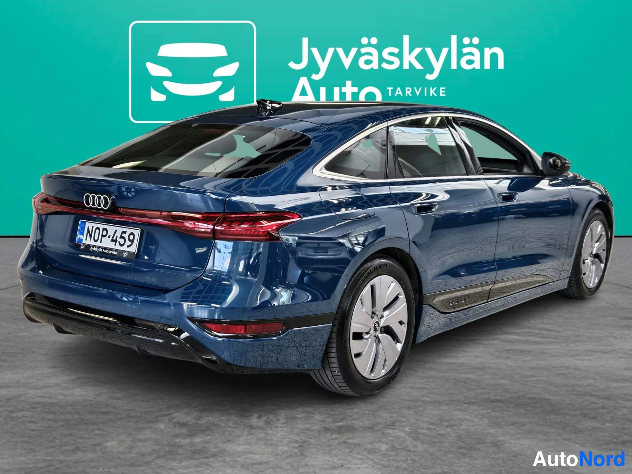 Blå Audi A6 e-tron 2026, snett bakifrån, bild 14