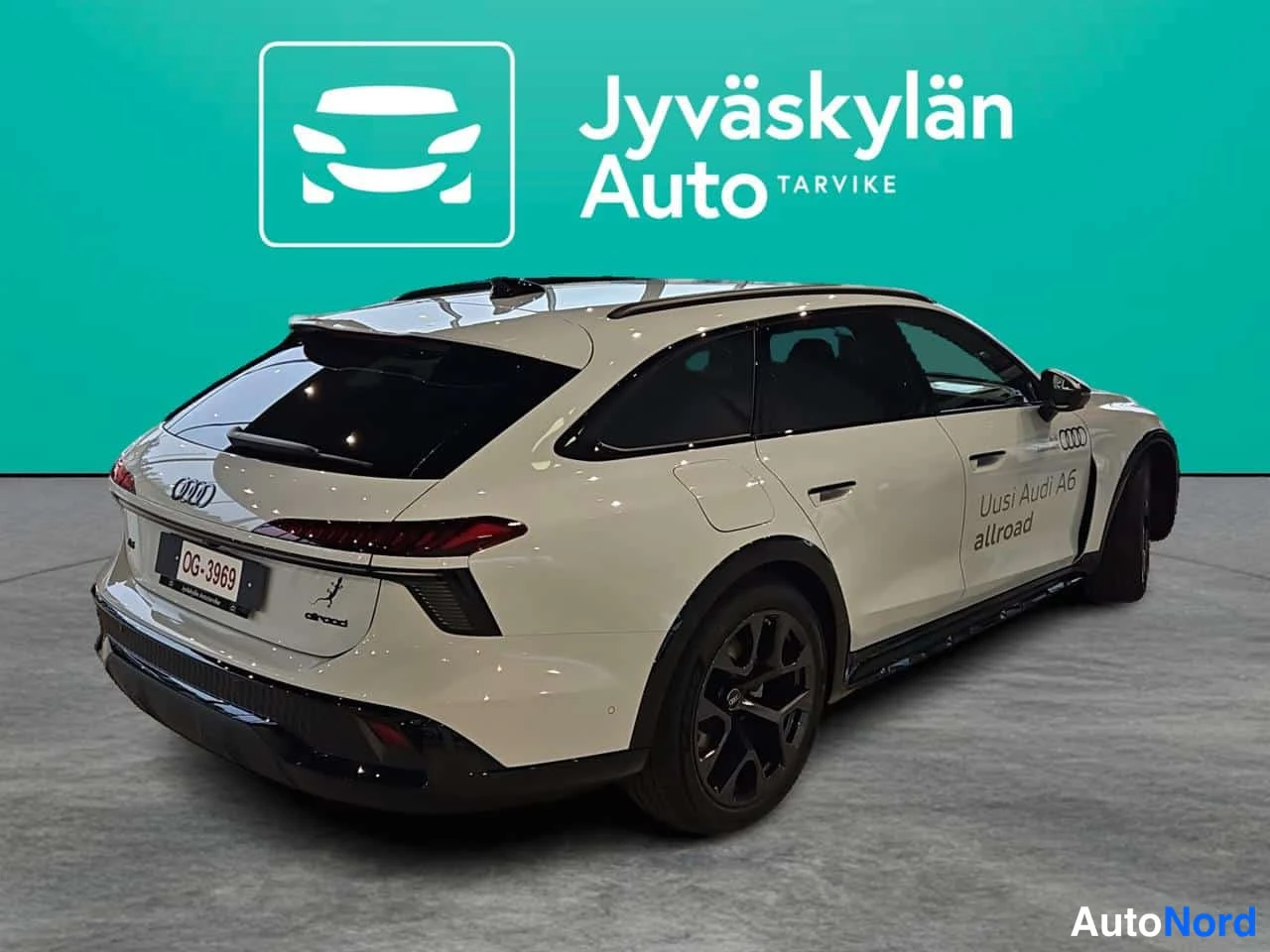 Valkoinen Audi A6 allroad quattro 2026, takaviisto, kuva 6