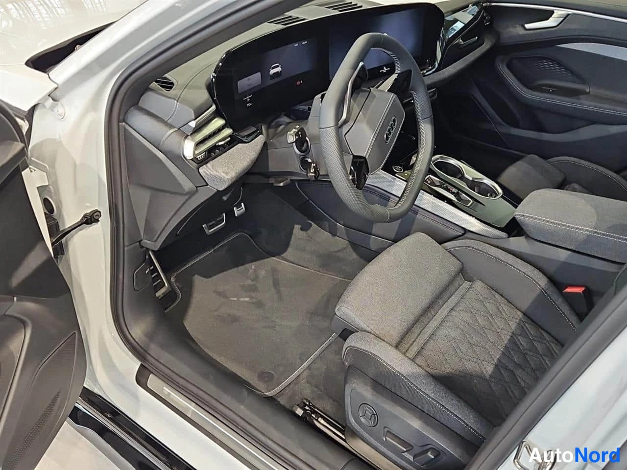 Valkoinen Audi A6 allroad quattro 2026, ohjaamo, kuva 7