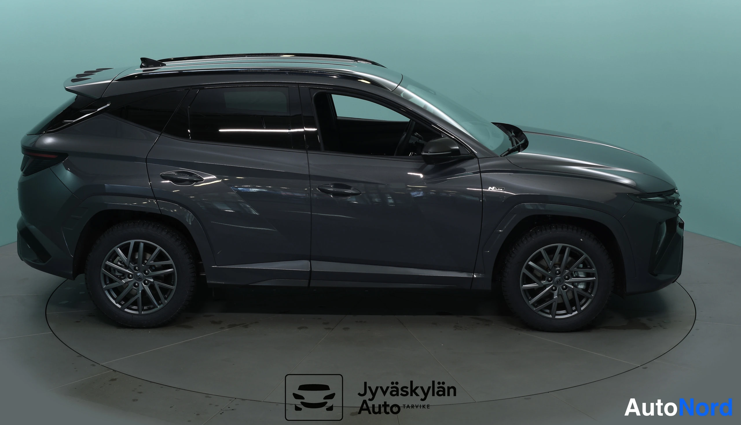 Harmaa Hyundai Tucson 2026, etuviisto, keula oikealle, kuva 6