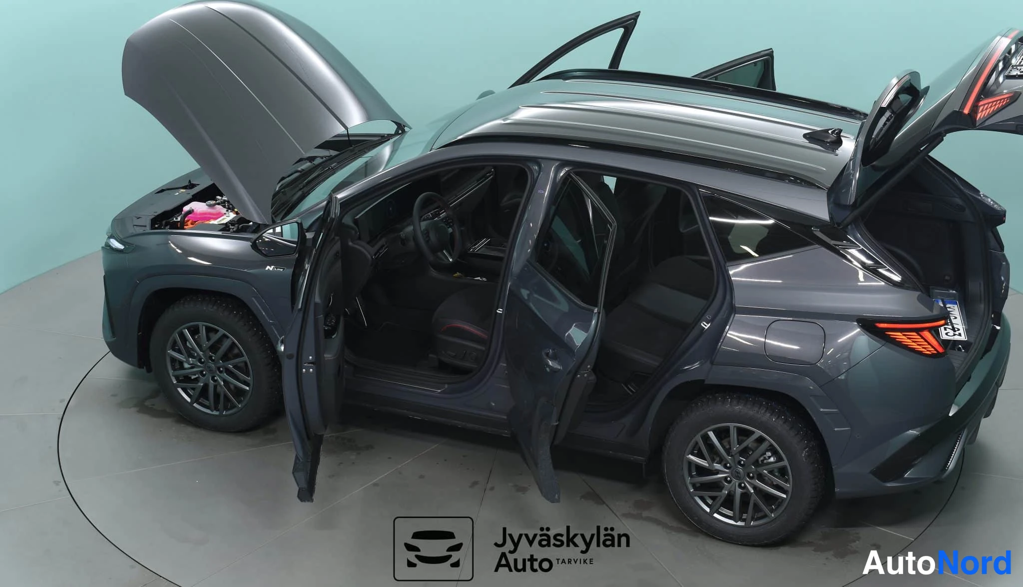 Harmaa Hyundai Tucson 2026, etuviisto, keula vasemmalle, kuva 3
