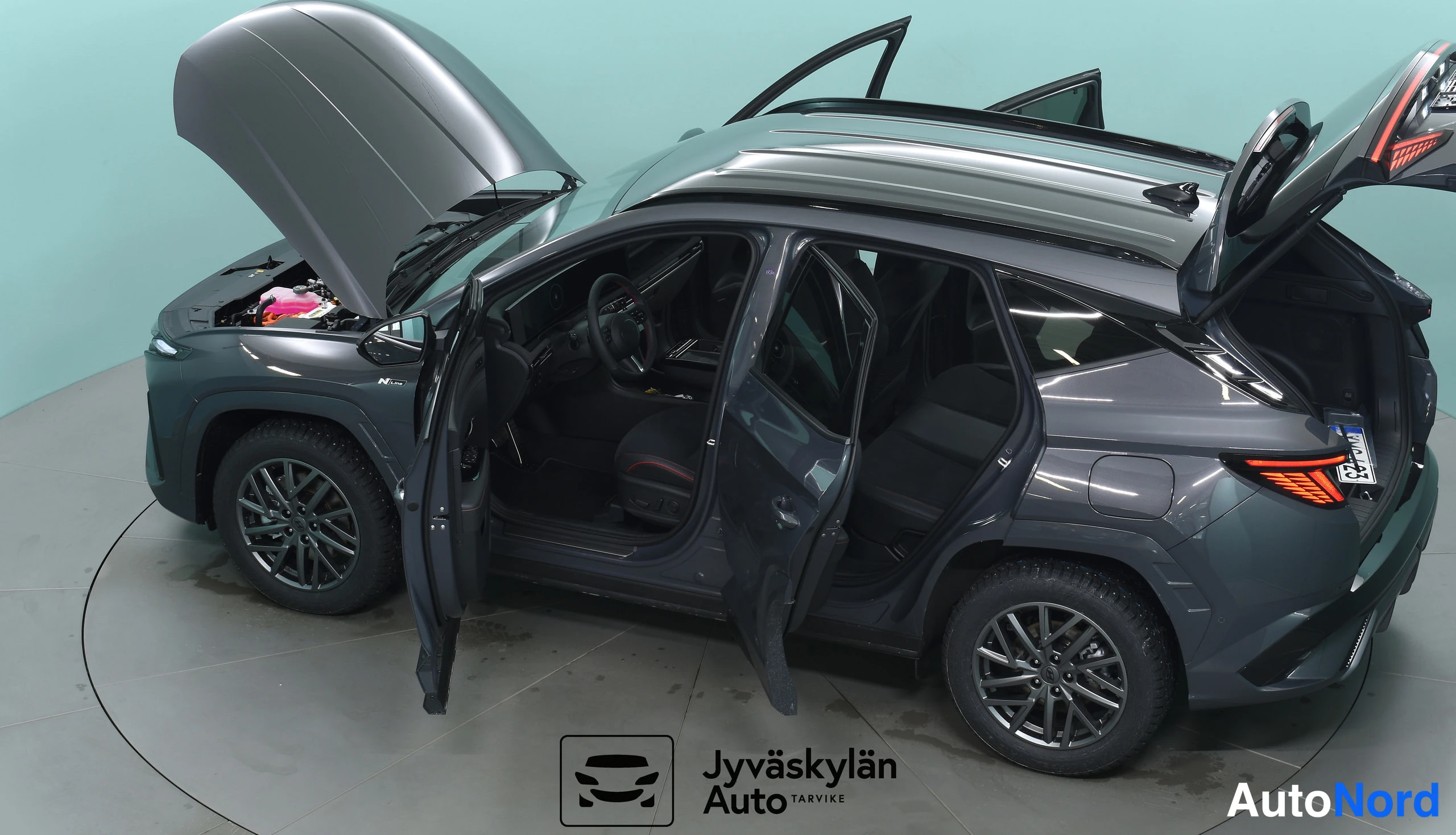 Harmaa Hyundai Tucson 2026, etuviisto, keula vasemmalle, kuva 4