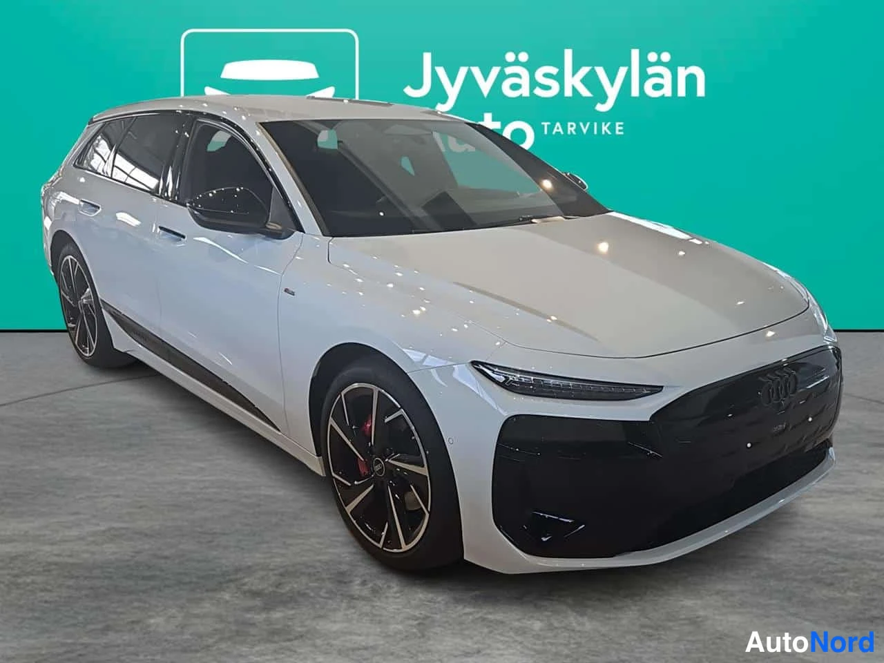 Valkoinen Audi A6 e-tron 2027, etuviisto, keula oikealle, kuva 2