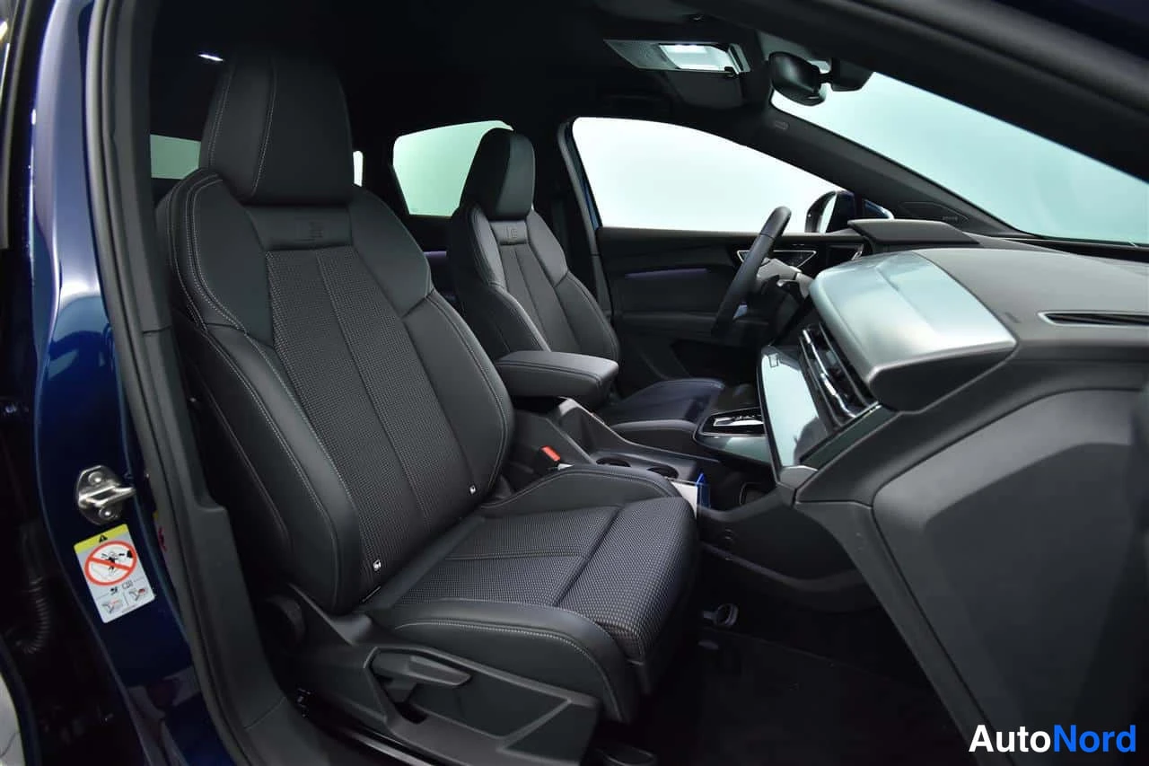 Sininen Audi Q4 e-tron 2024, etuistuimet, kuva 21