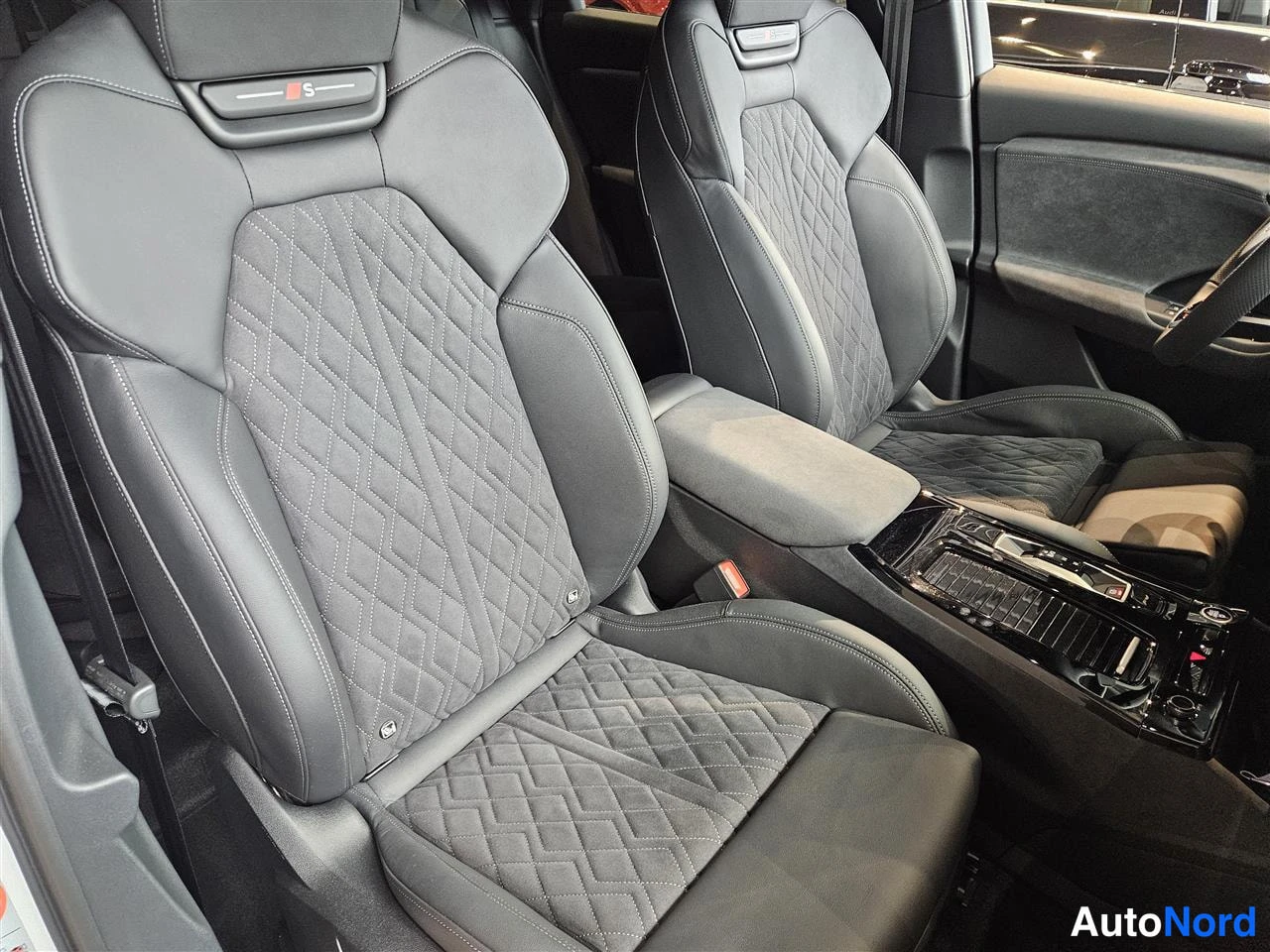 White Audi Q6 e-tron 2026, front seats, photo 14