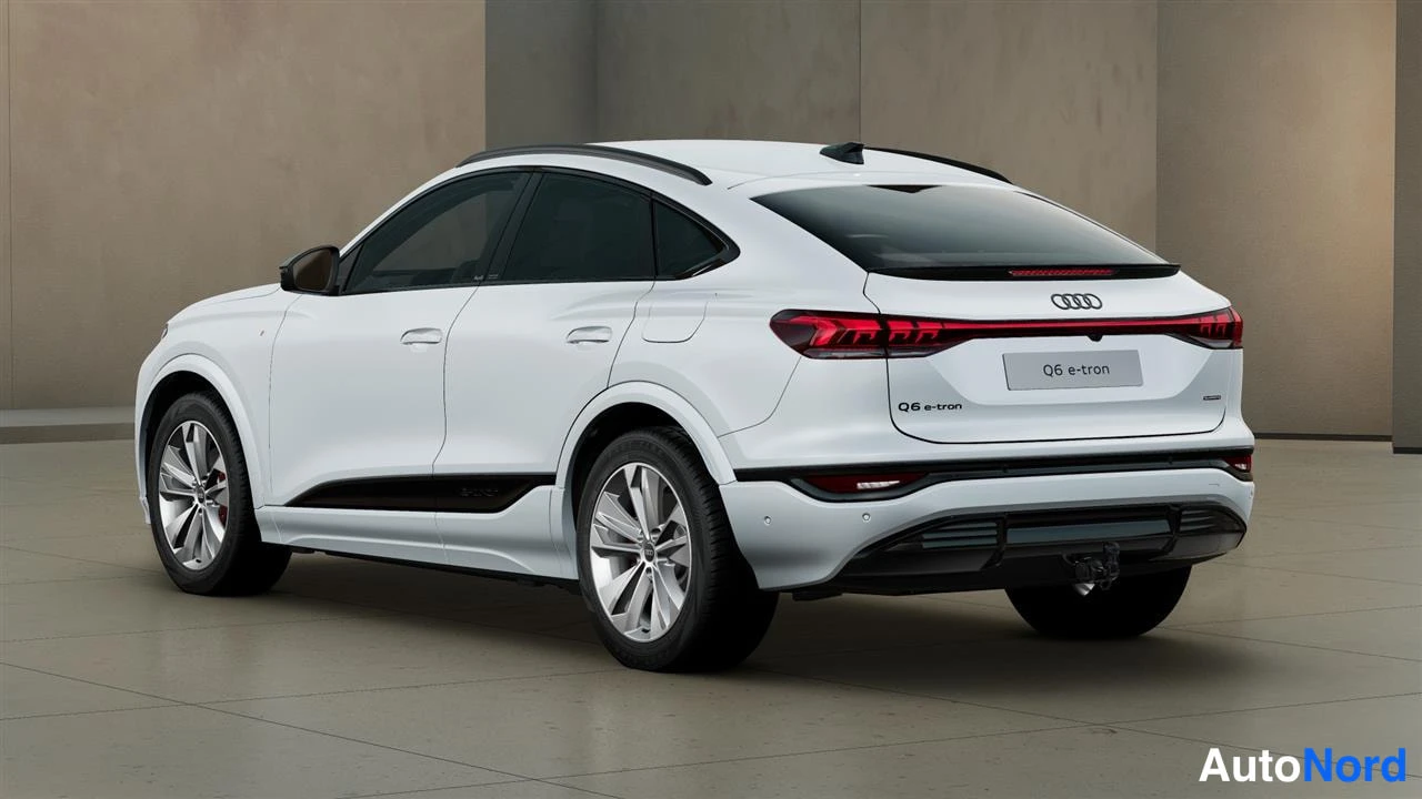 White Audi Q6 e-tron 2026, rear three-quarter, photo 6