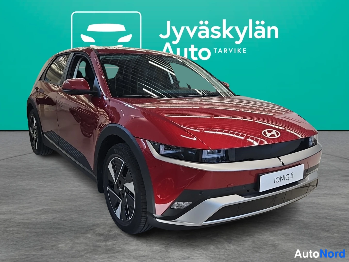Punainen Hyundai IONIQ 5 2026, etuviisto, keula oikealle, kuva 3