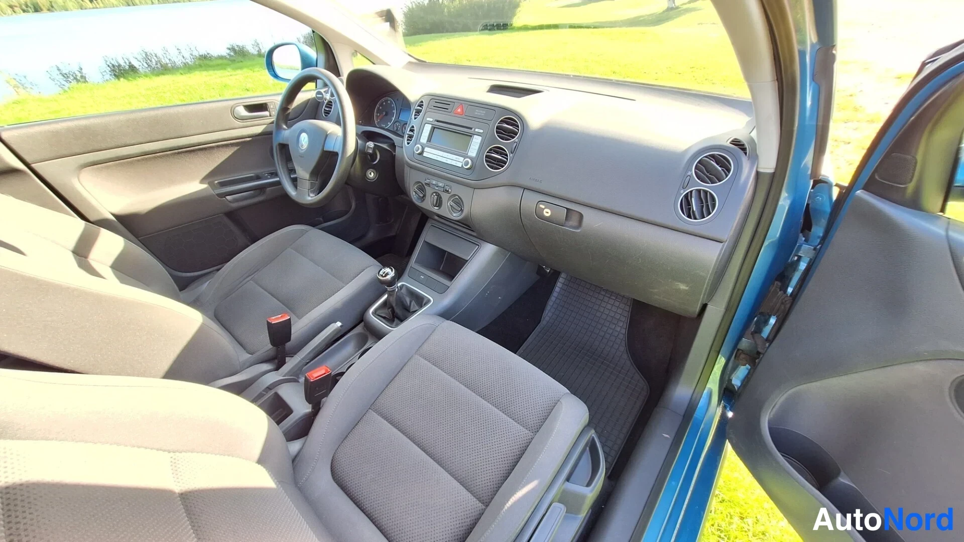 Blå Volkswagen Golf Plus 2007, förarplats, bild 6