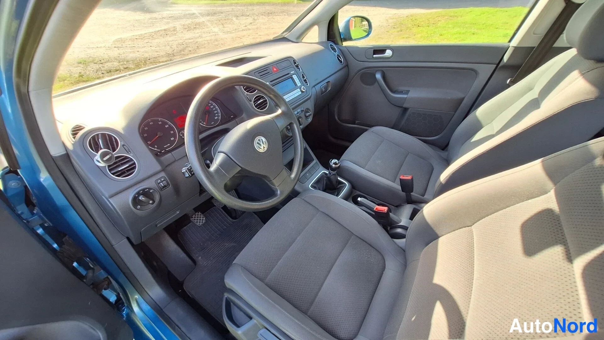 Blå Volkswagen Golf Plus 2007, förarplats, bild 7