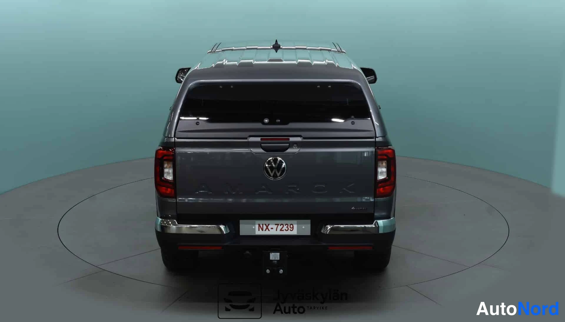 Grå Volkswagen Amarok 2026, bakifrån, bild 12
