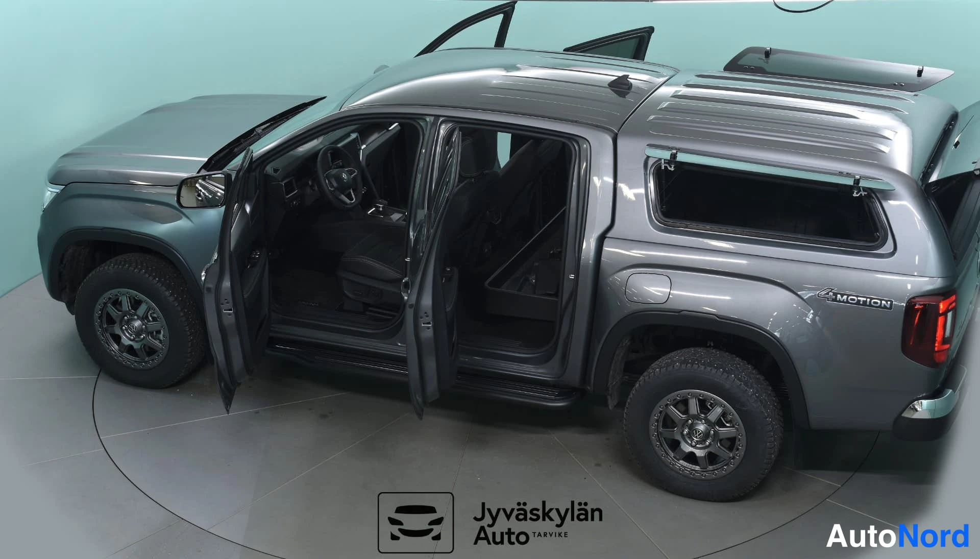 Grå Volkswagen Amarok 2026, snett bakifrån, bild 9