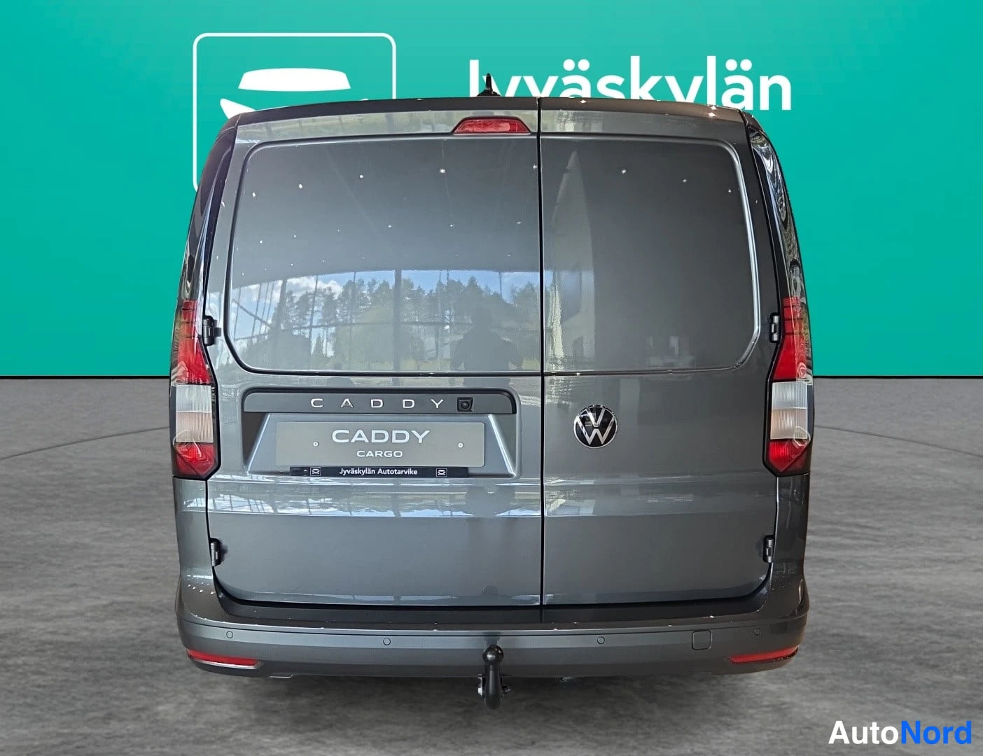 Grå Volkswagen Caddy 2026, bakifrån, bild 6