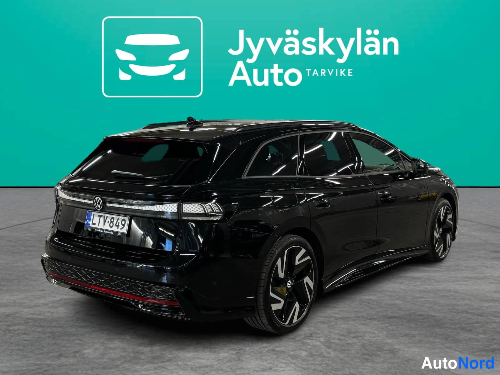 Musta Volkswagen ID.7 2026, takaviisto, kuva 6