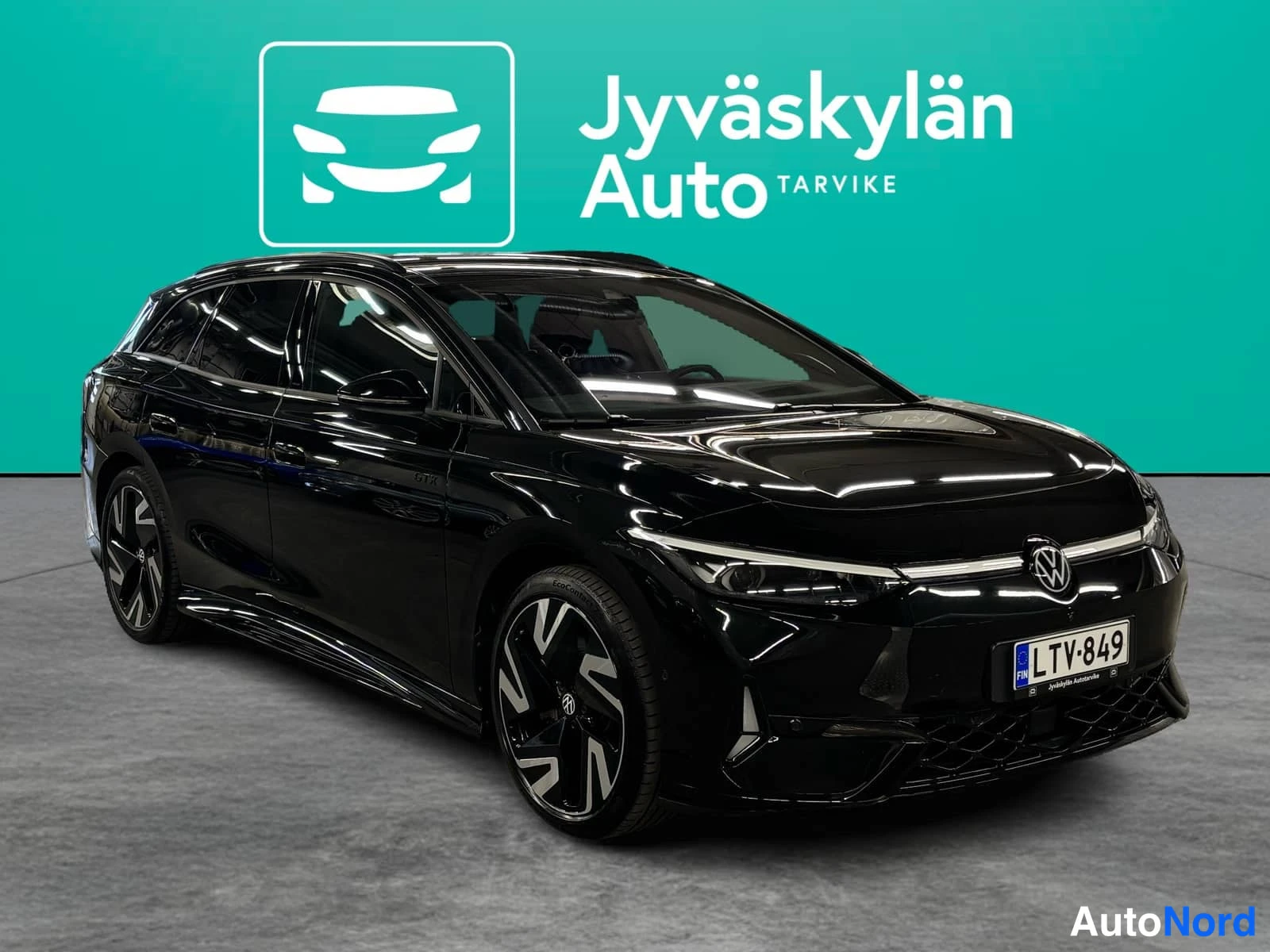 Musta Volkswagen ID.7 2026, etuviisto, keula oikealle, kuva 3