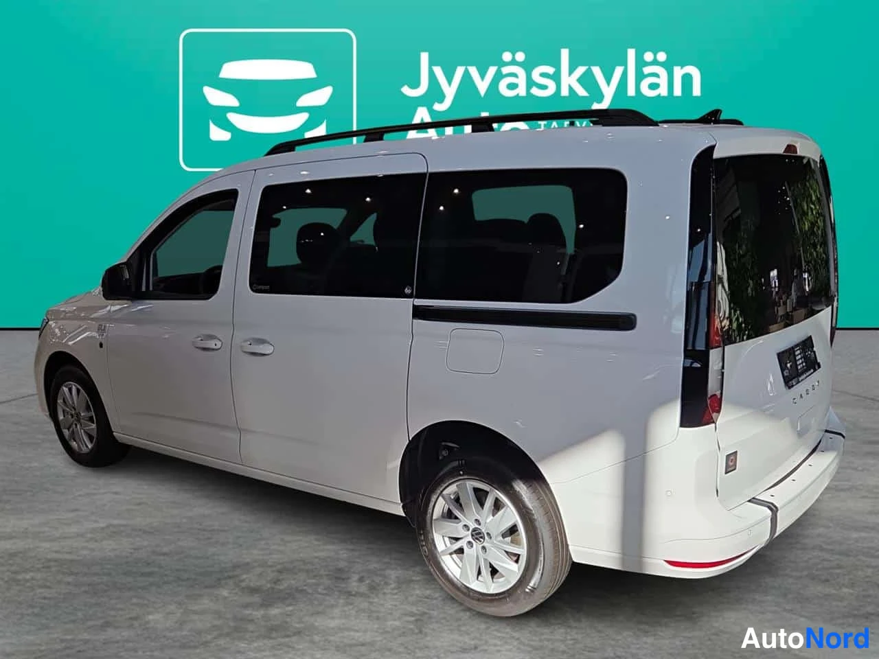 Valkoinen Volkswagen Caddy 2026, takaviisto, kuva 2