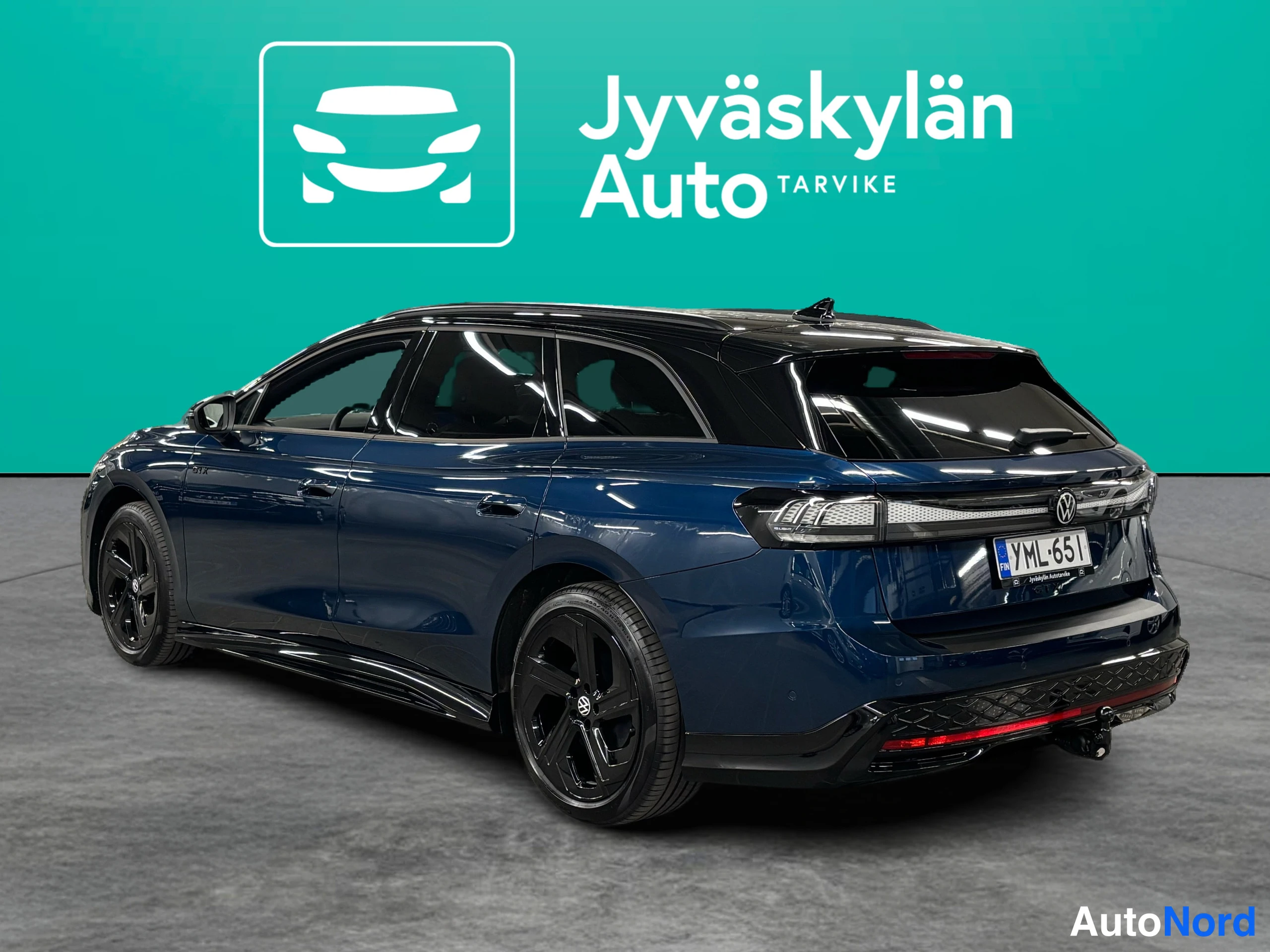Sininen Volkswagen ID.7 2025, takaviisto, kuva 12