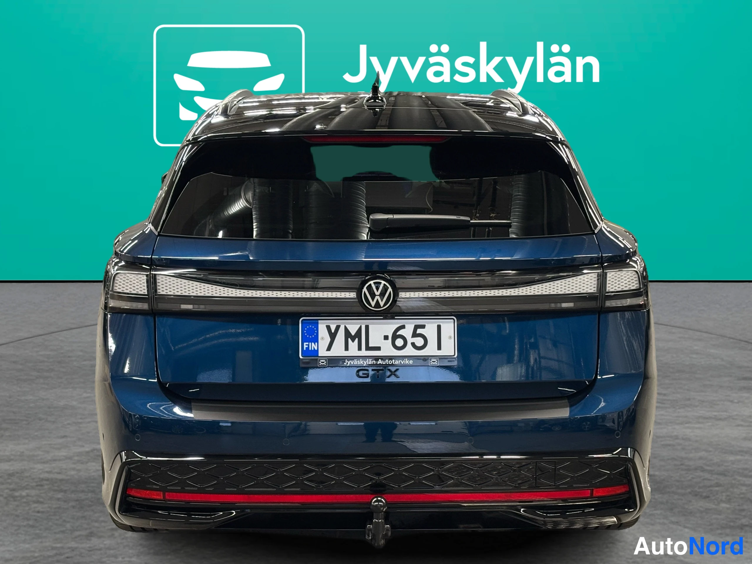 Sininen Volkswagen ID.7 2025, takaa, kuva 16