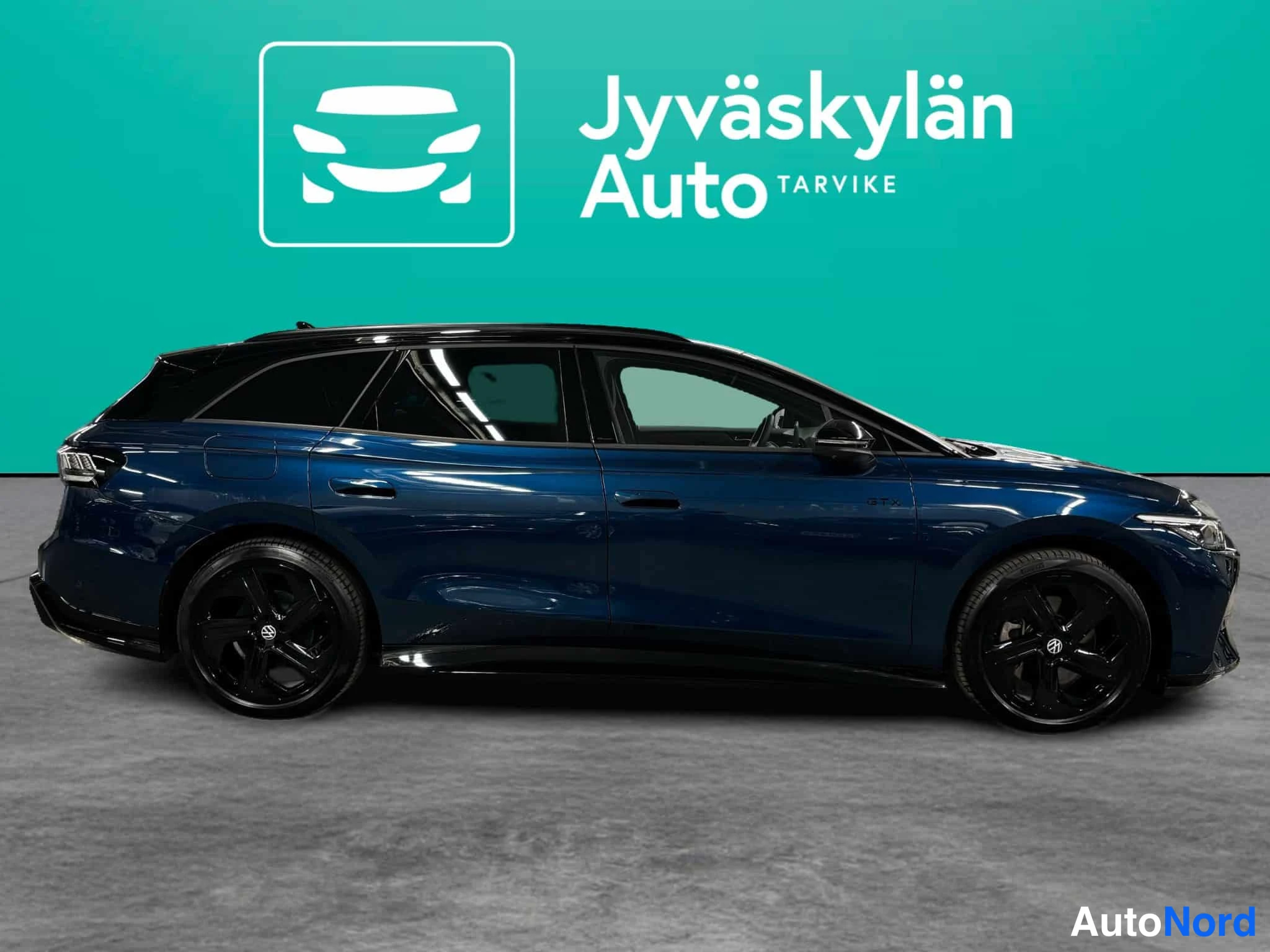 Sininen Volkswagen ID.7 2025, takaviisto, kuva 10
