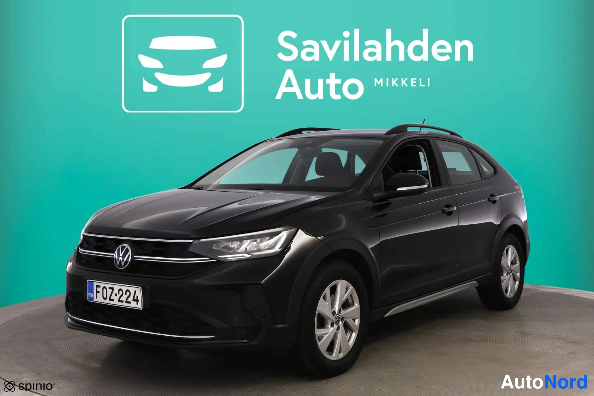 Musta Volkswagen Taigo 2021, etuviisto, keula vasemmalle, kuva 2