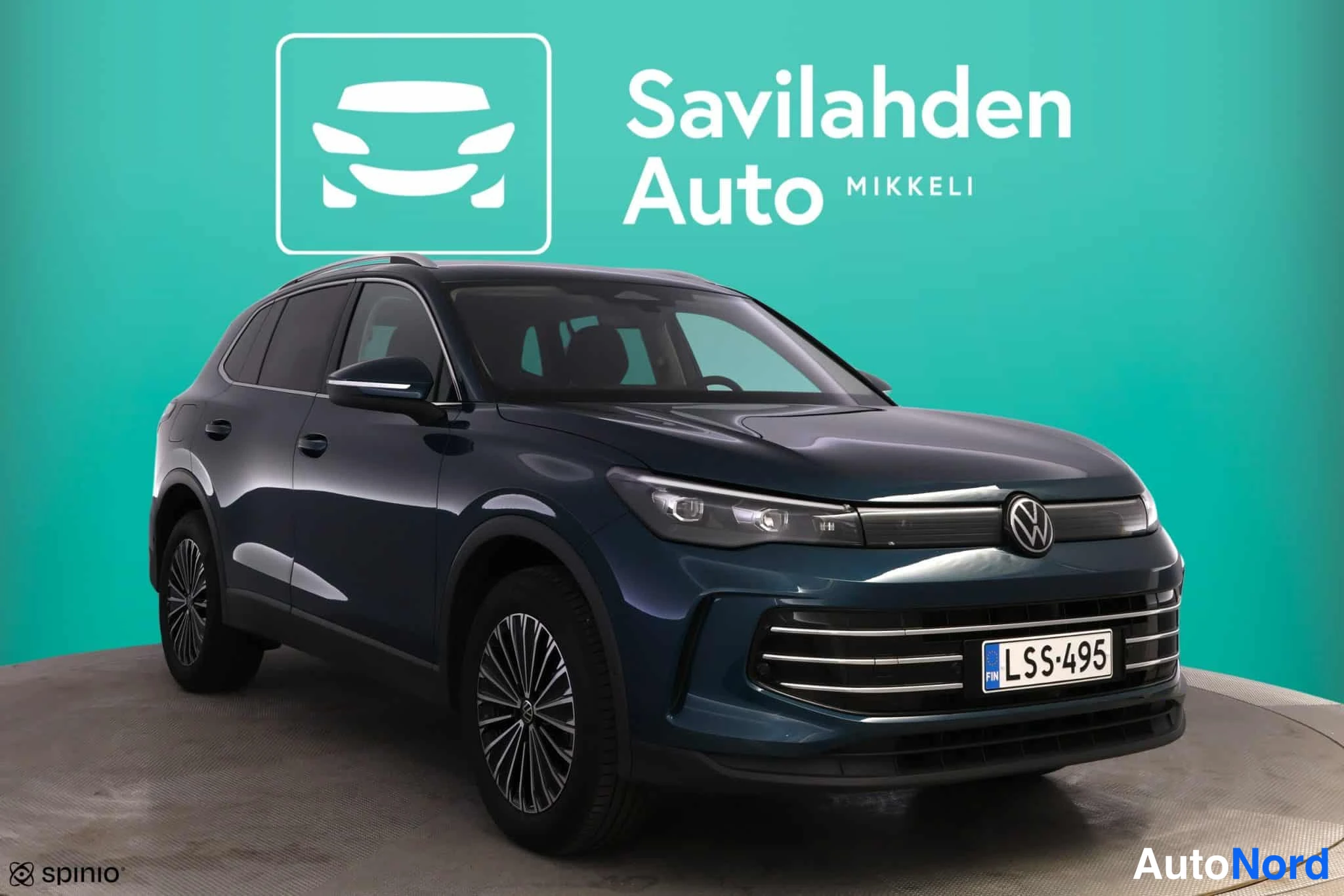 Sininen Volkswagen Tiguan 2024, etuviisto, keula oikealle, kuva 5