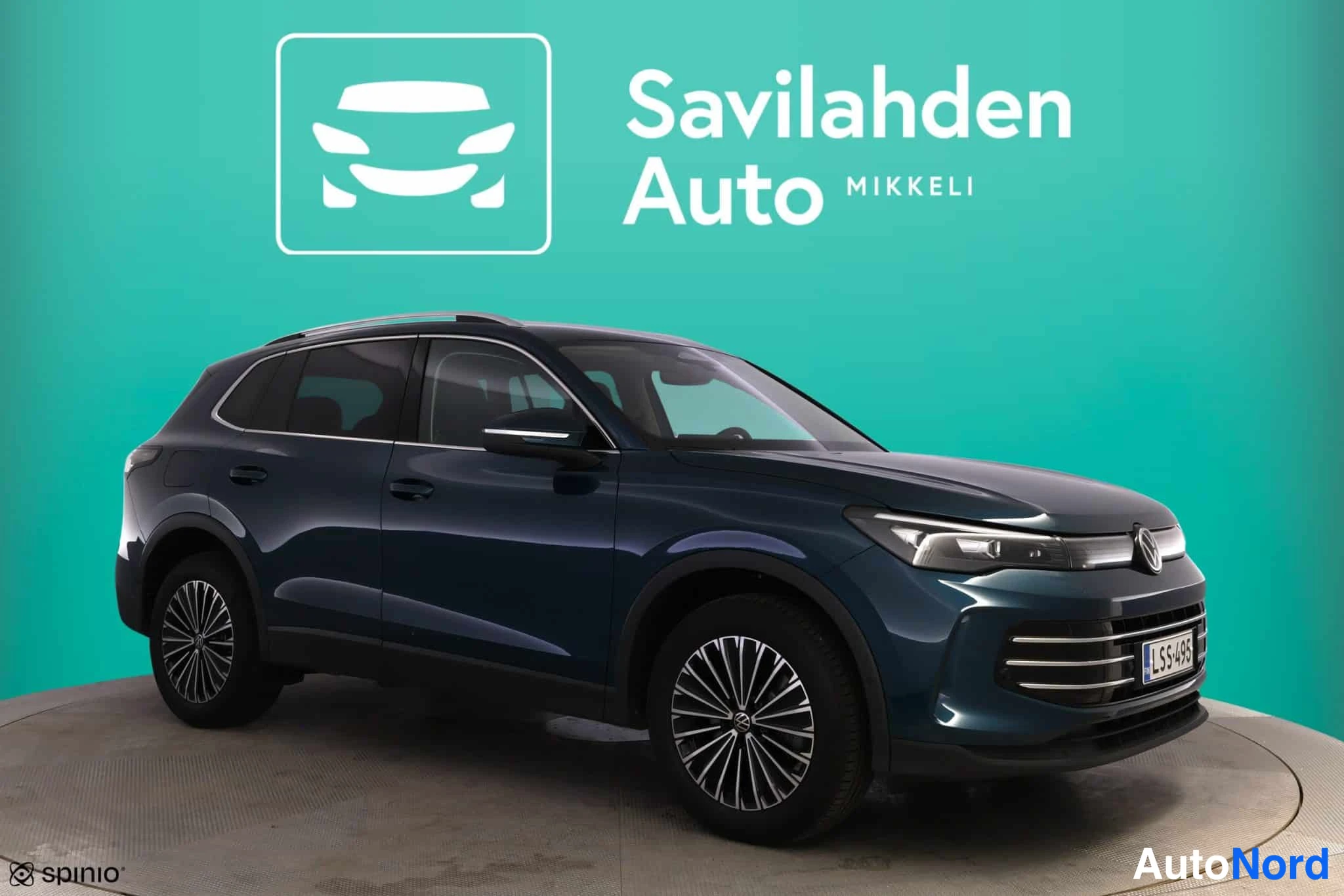 Sininen Volkswagen Tiguan 2024, etuviisto, keula oikealle, kuva 3