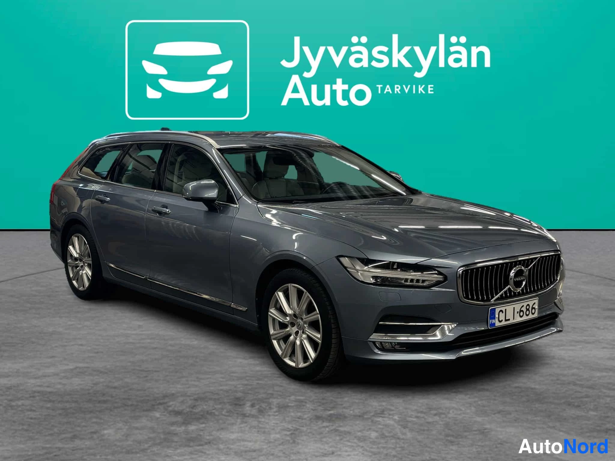 Sininen Volvo V90 2016, etuviisto, keula oikealle, kuva 3