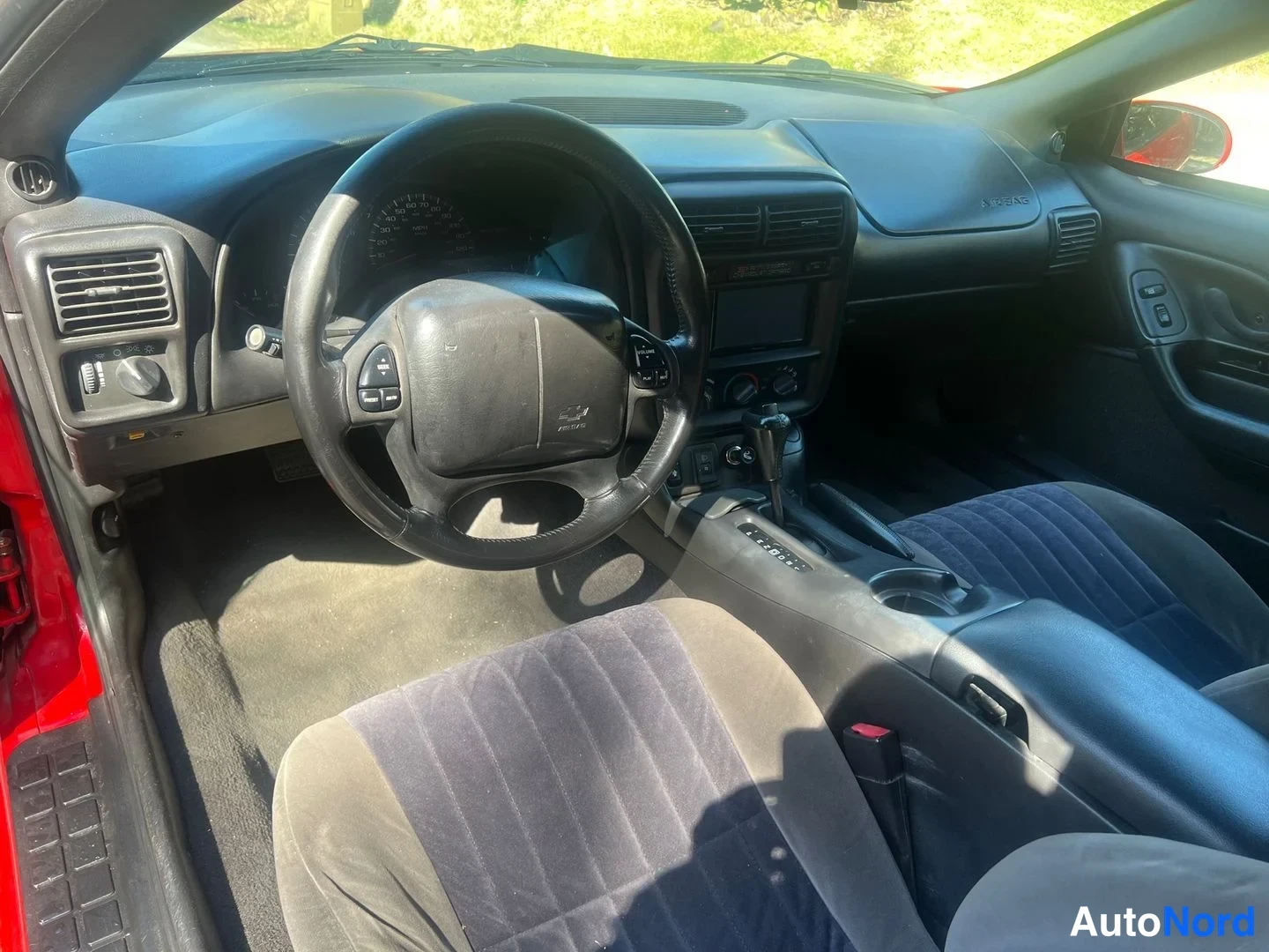 Röd Chevrolet Camaro 2000, förarplats, bild 20