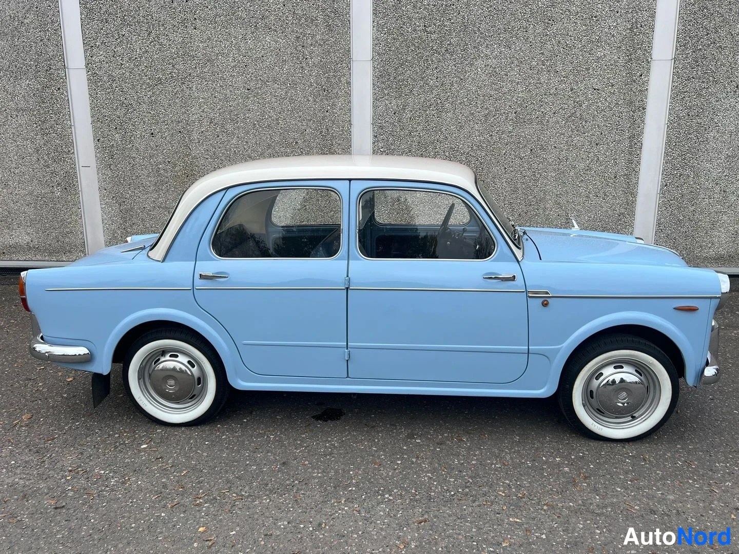 Blå Fiat 1100 1960, från sidan, bild 7