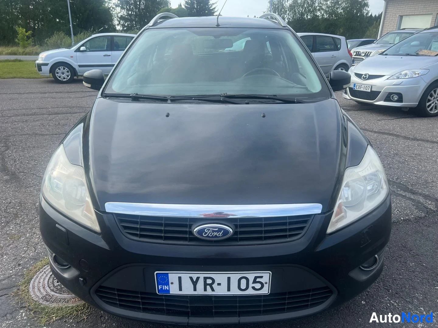 Svart Ford Focus 2008, framifrån, bild 6