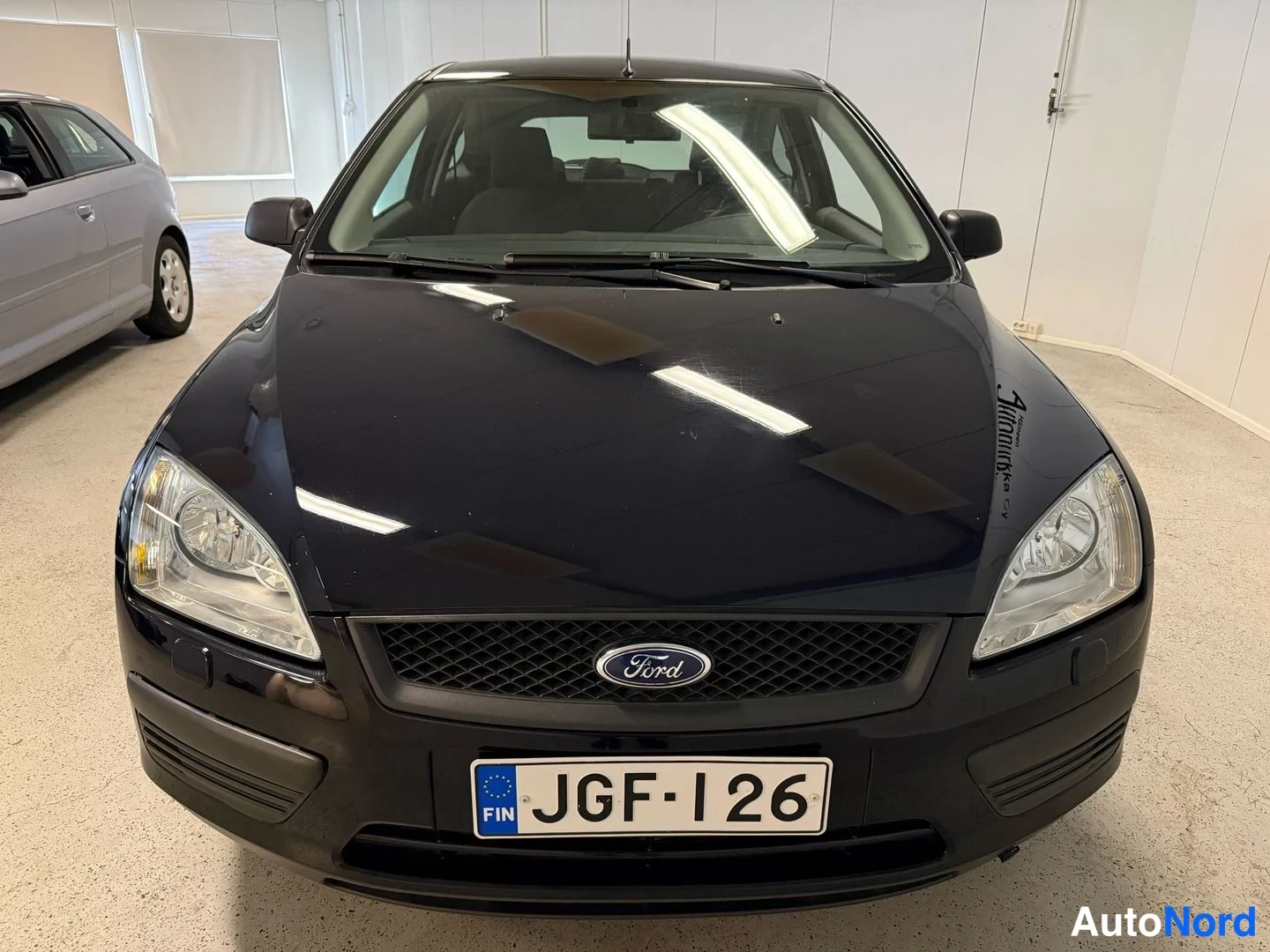 Blå Ford Focus 2005, framifrån, bild 4