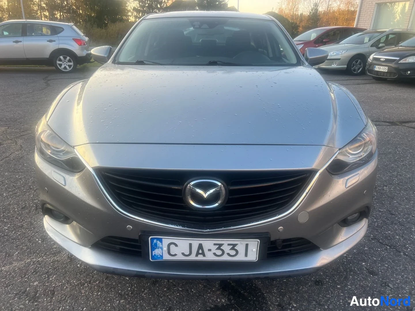 Grå Mazda 6 2014, framifrån, bild 5