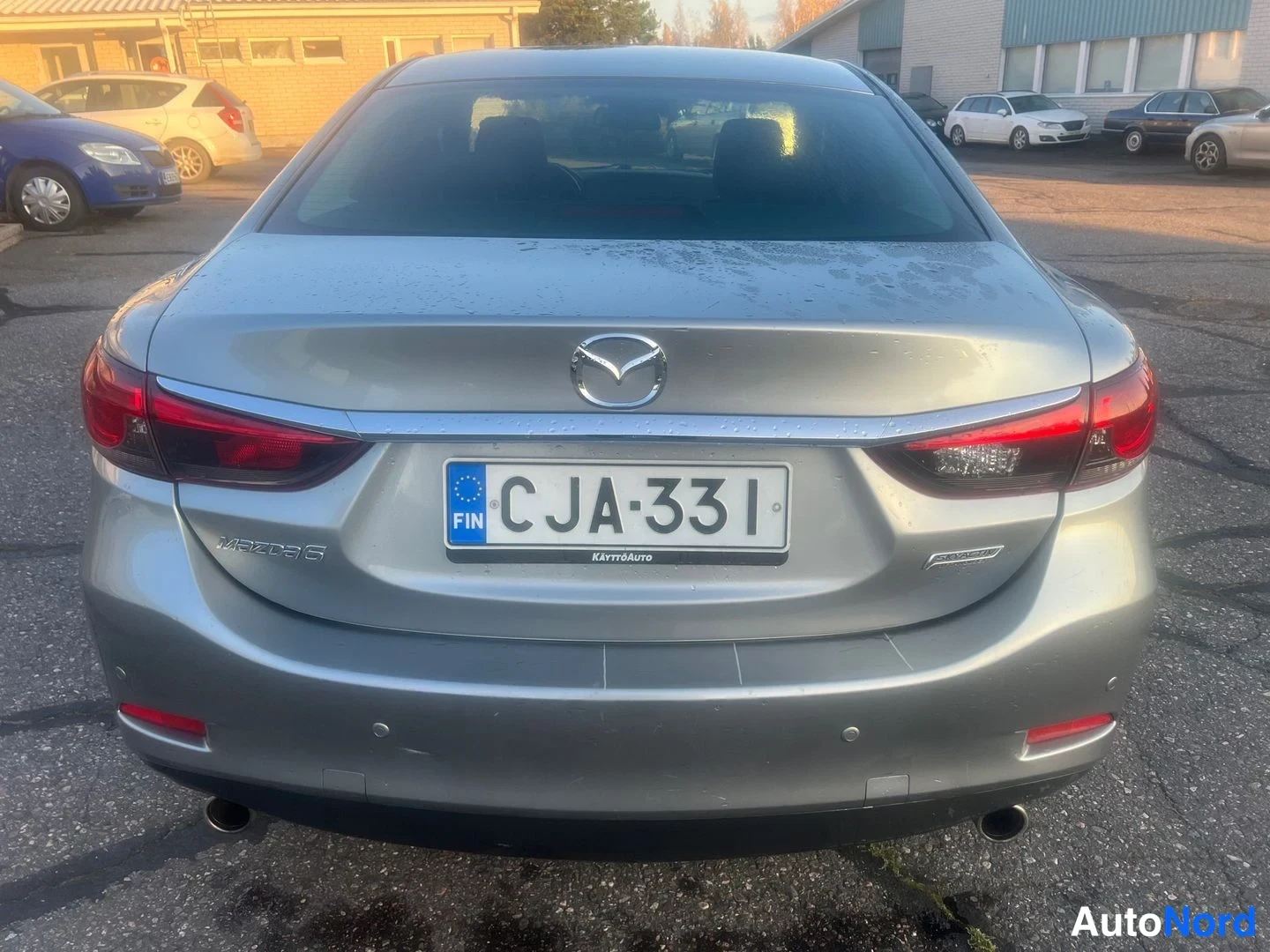 Grå Mazda 6 2014, bakifrån, bild 9
