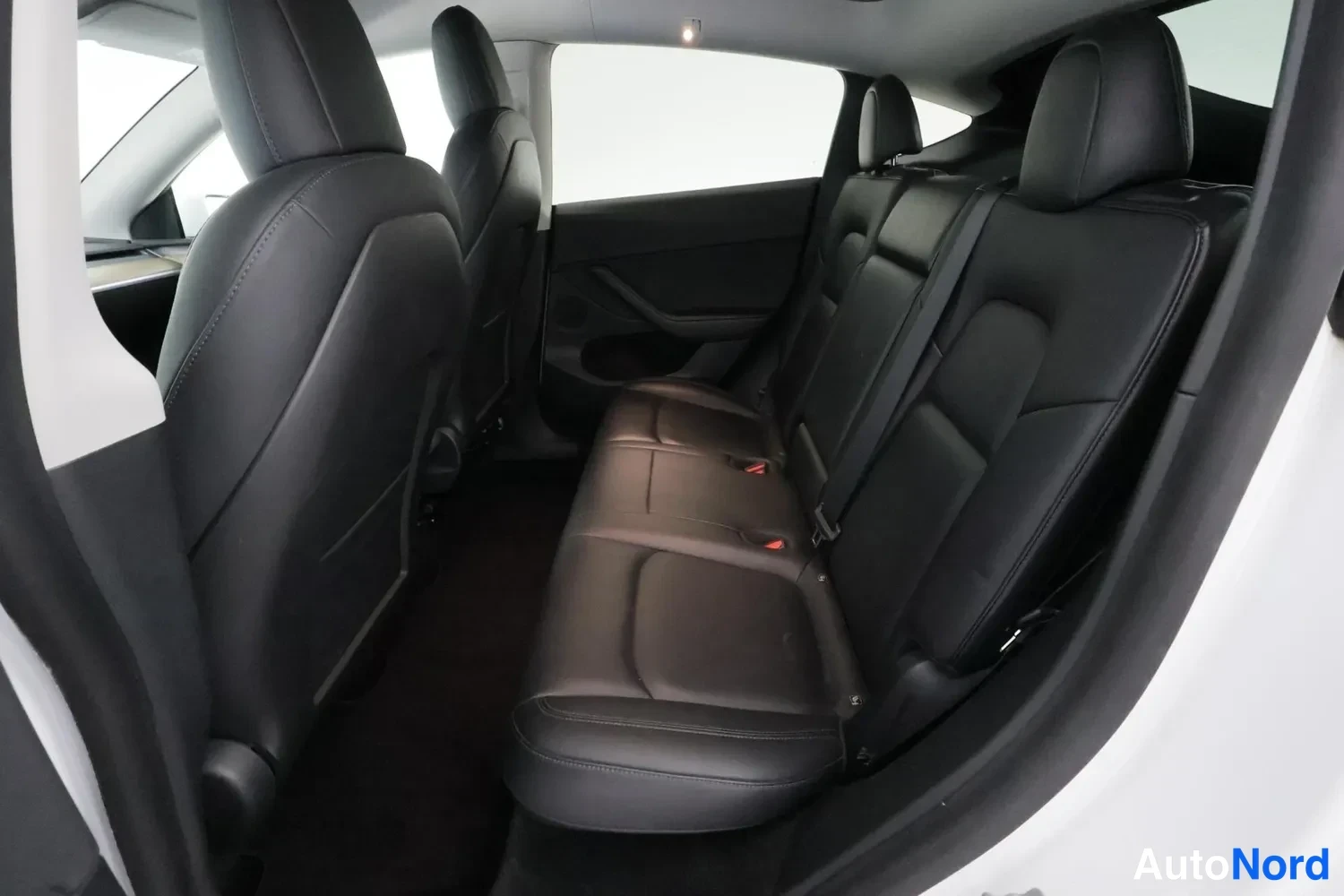 White Tesla Model Y 2022, rear seats, photo 7