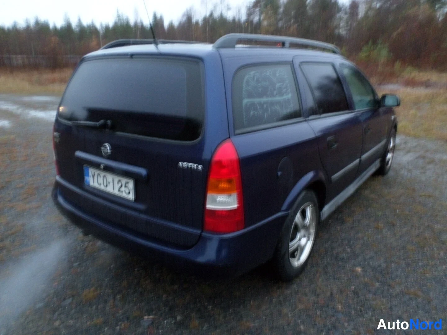 Sininen Opel Astra 1999, takaviisto, kuva 6