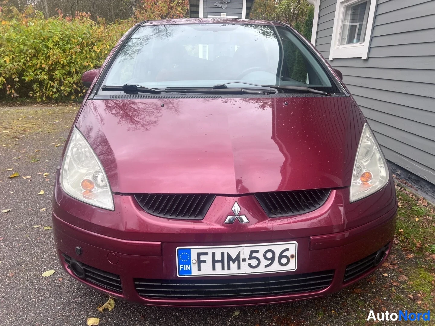 Red Mitsubishi Colt 2006, front, photo 2