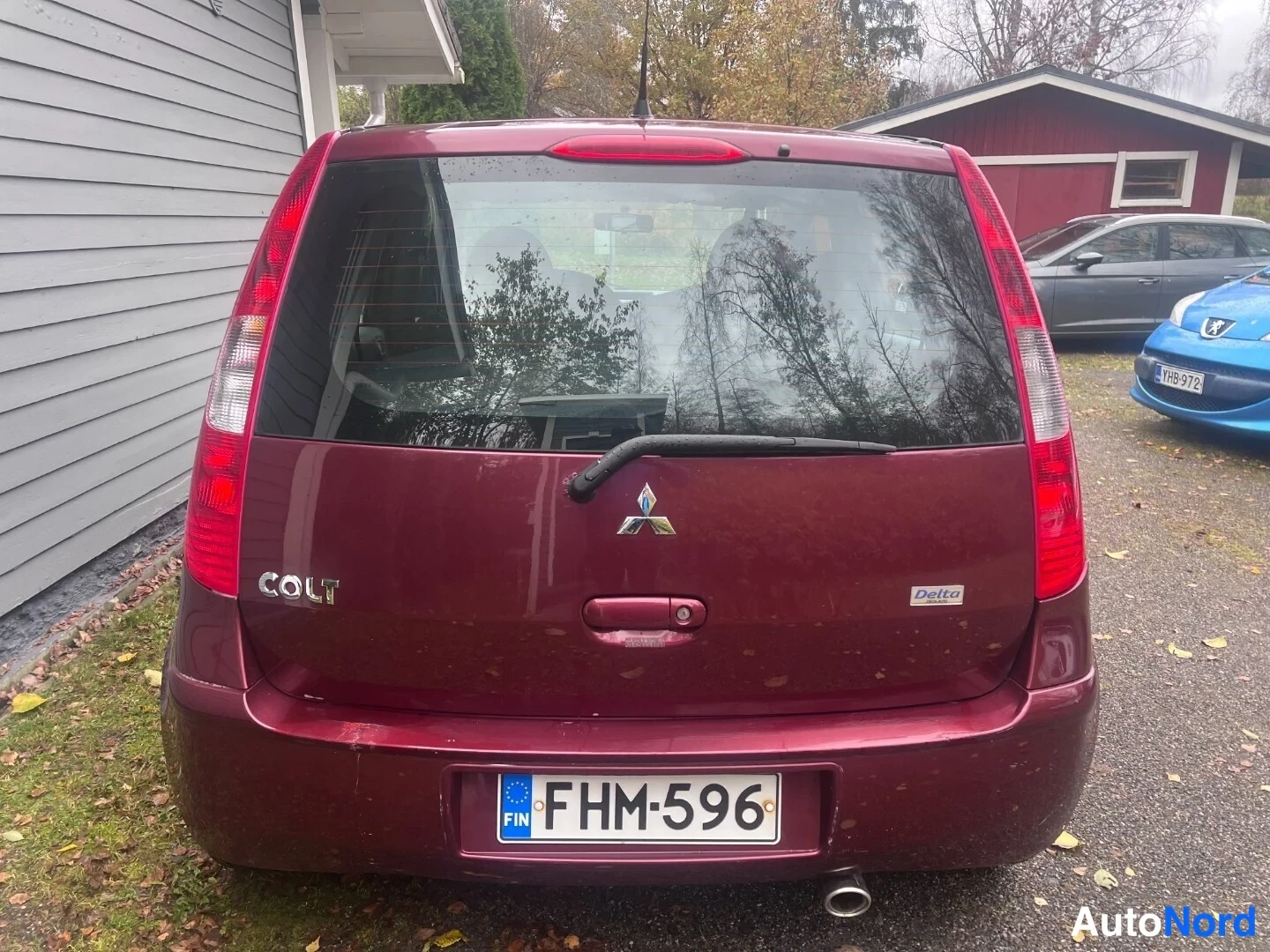 Red Mitsubishi Colt 2006, rear, photo 5