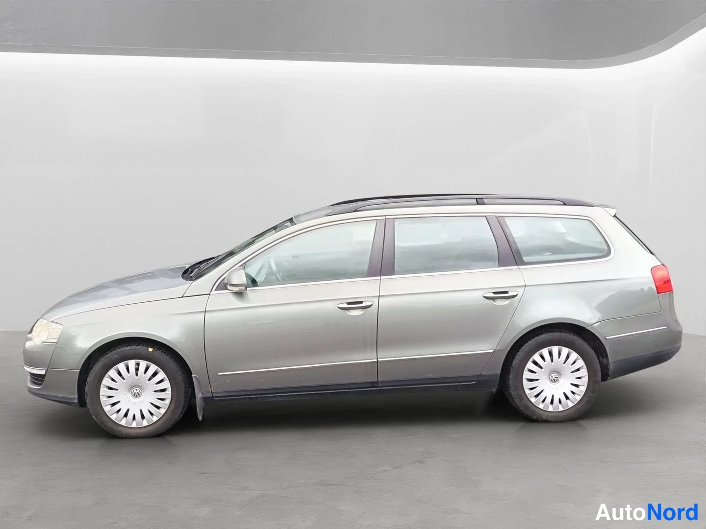 Vihreä Volkswagen Passat Variant 2008, sivulta, kuva 5