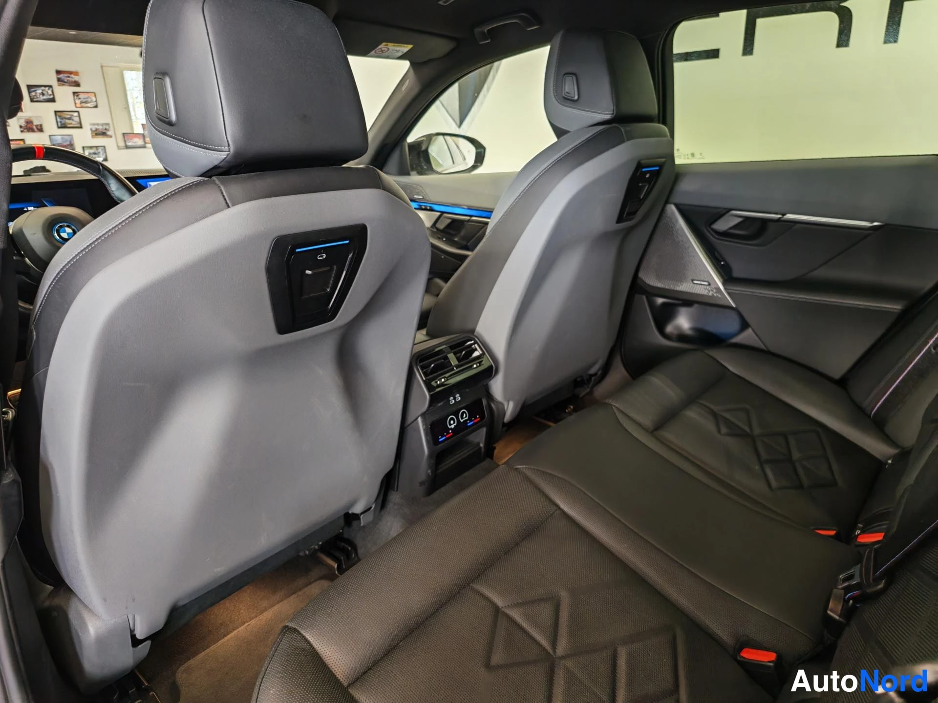 Grey BMW i5 2024, rear seats, photo 16