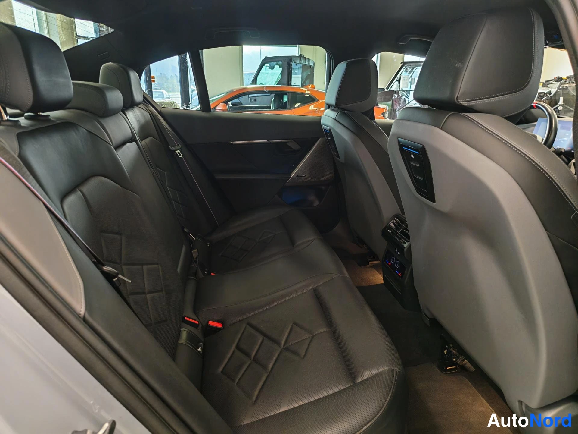 Grey BMW i5 2024, rear seats, photo 17